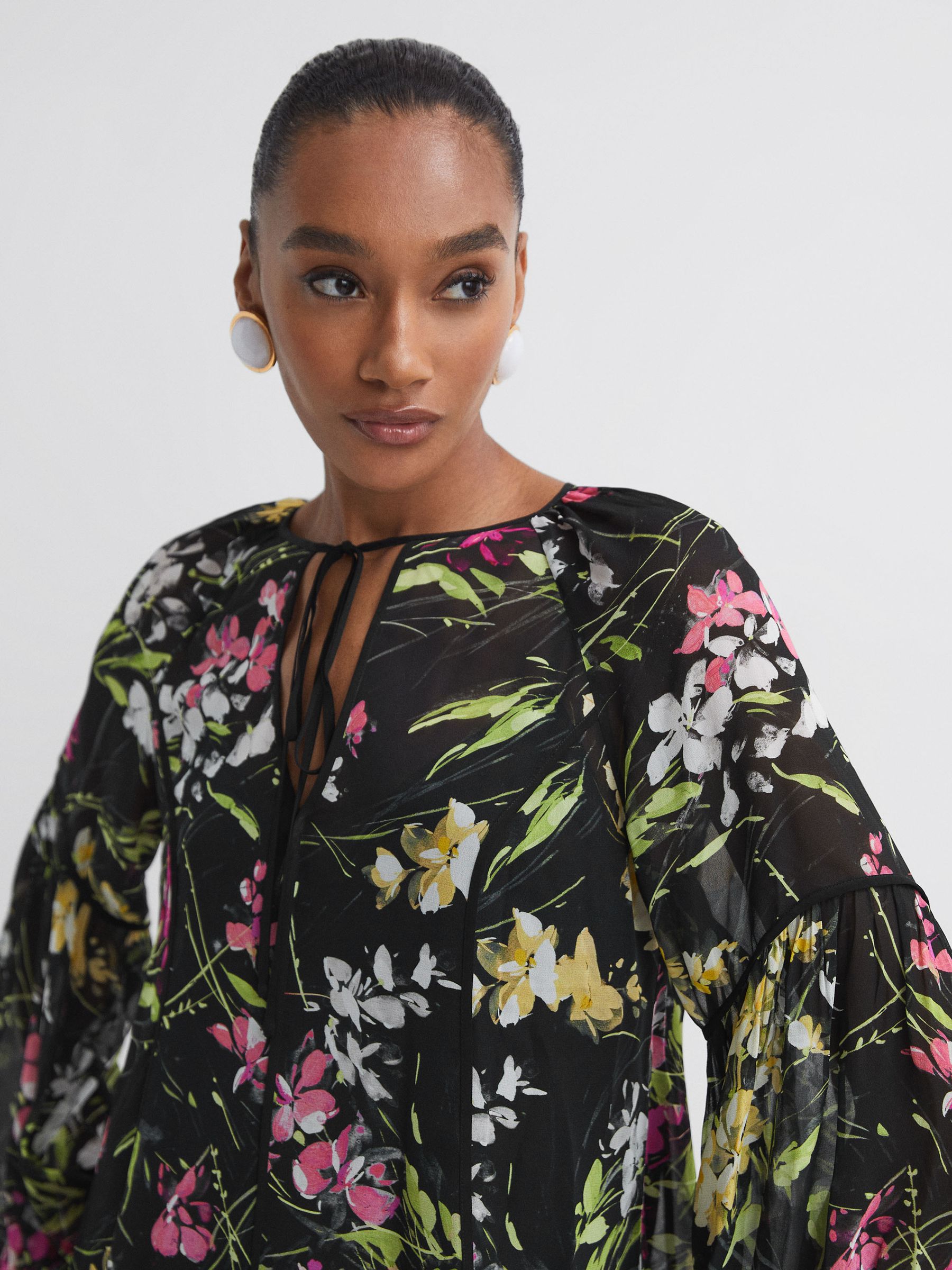Florere Sheer Floral Tie Neck Blouse in Black