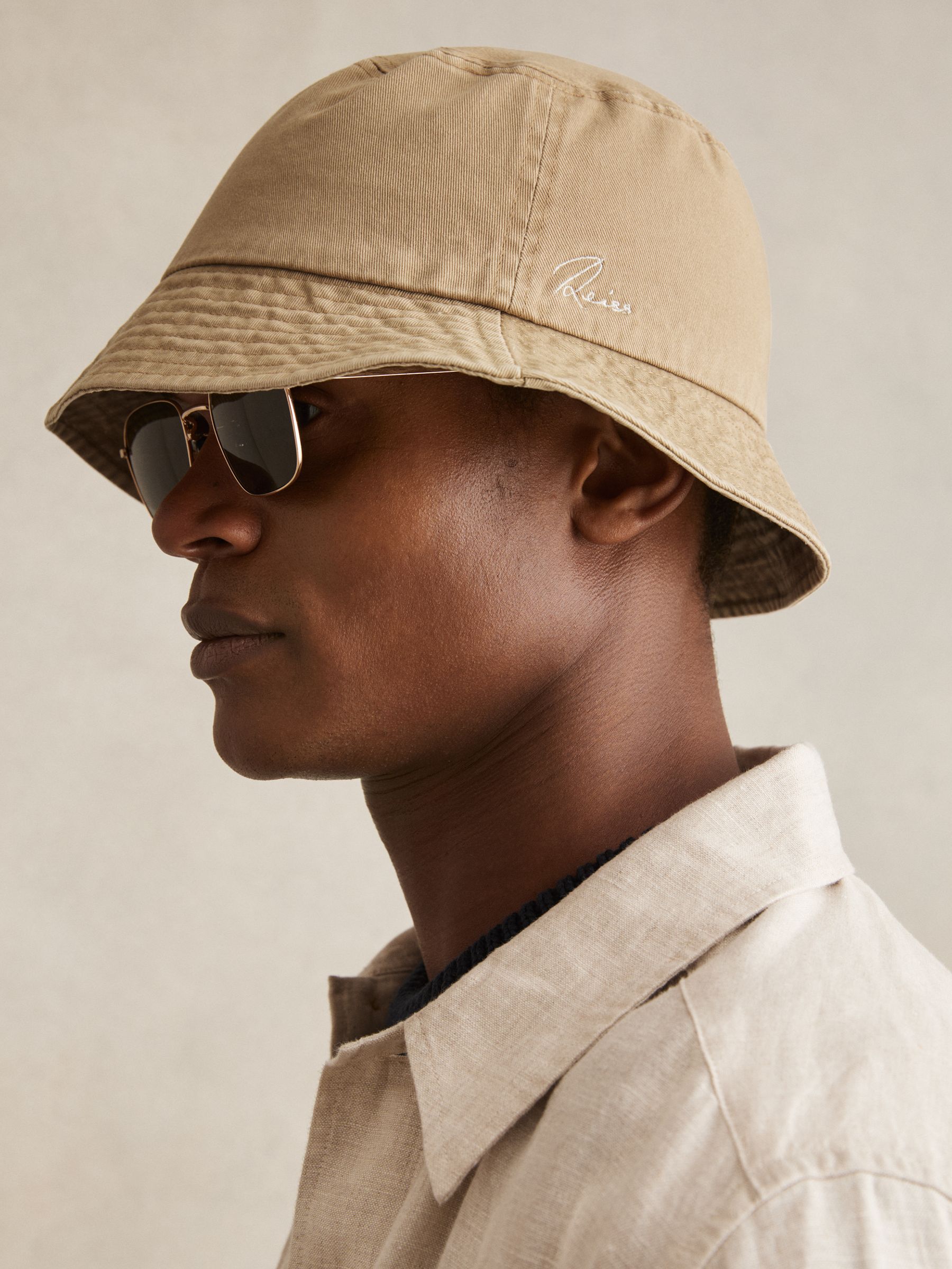 Cotton Logo-Embroidered Bucket Hat in Camel