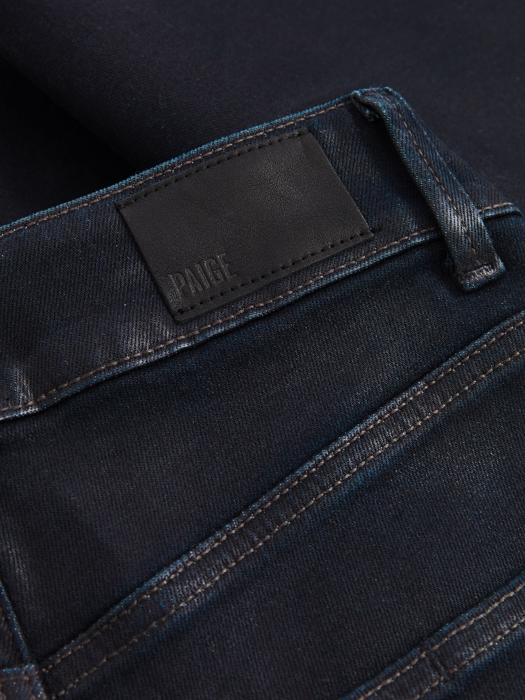 Paige Angled-Waist Flared Jeans in Kira Blue