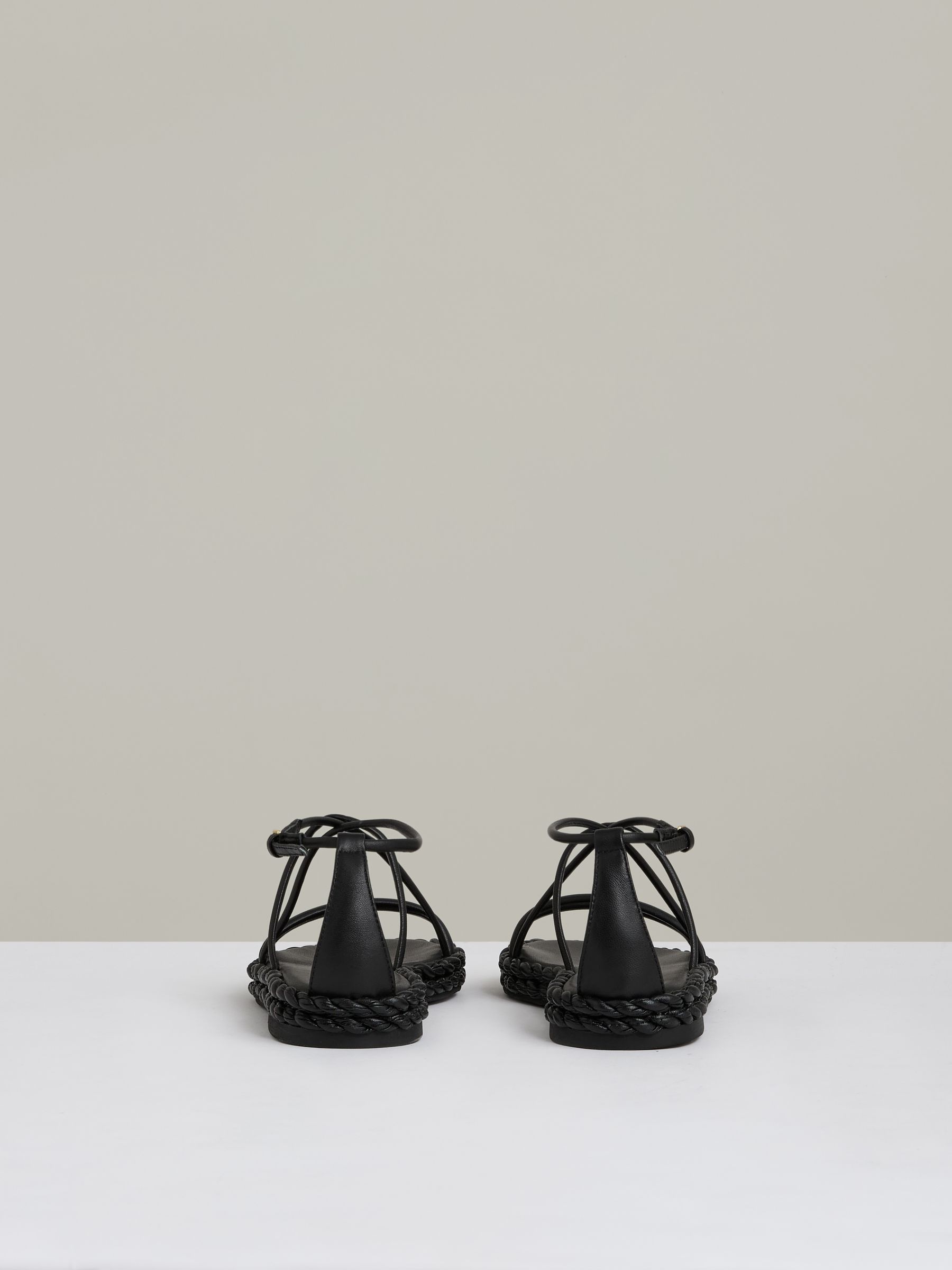 Leather Braided Flat Sandals in Black