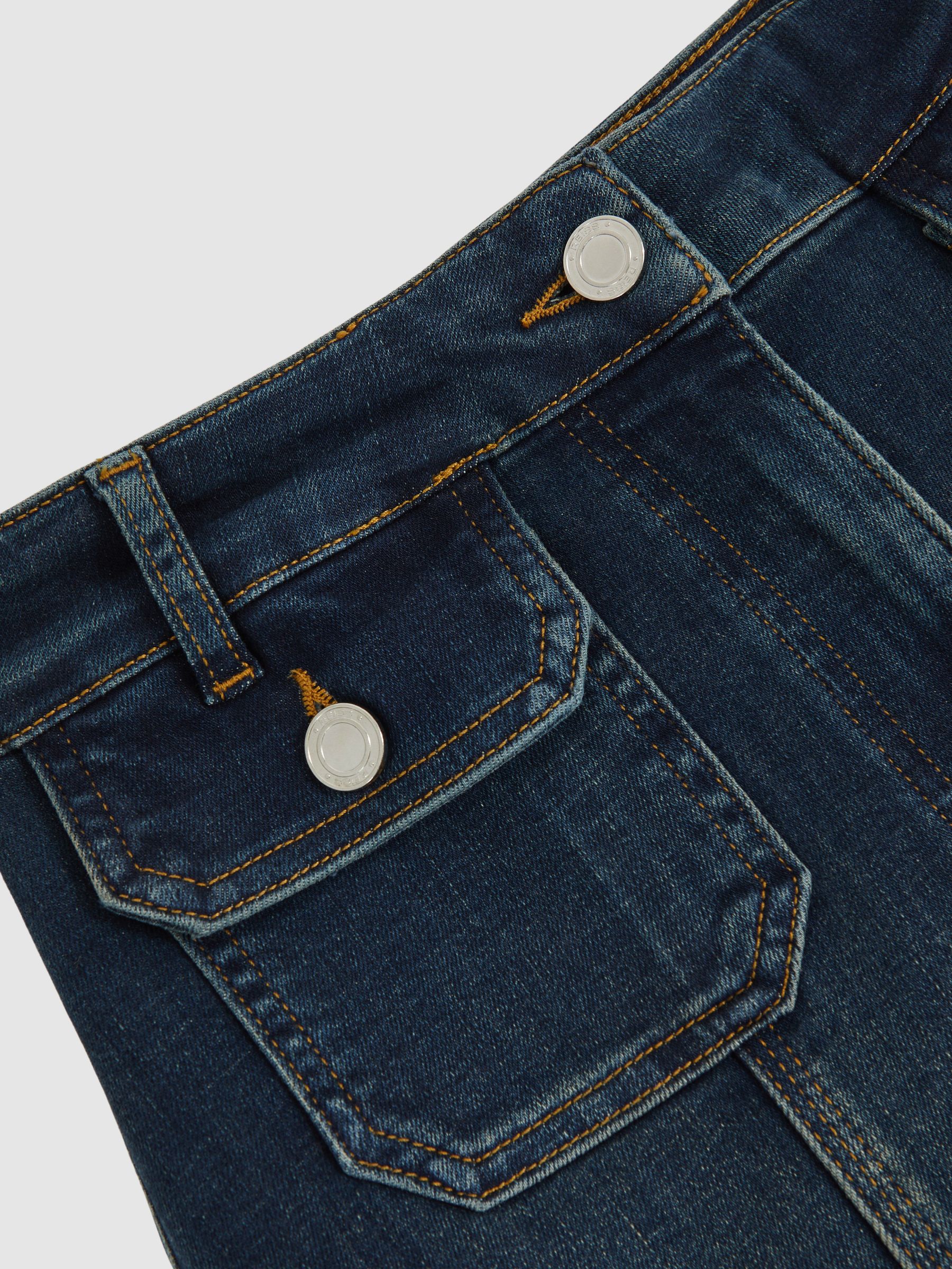 Button-Pocket Flared Jeans in Mid Blue