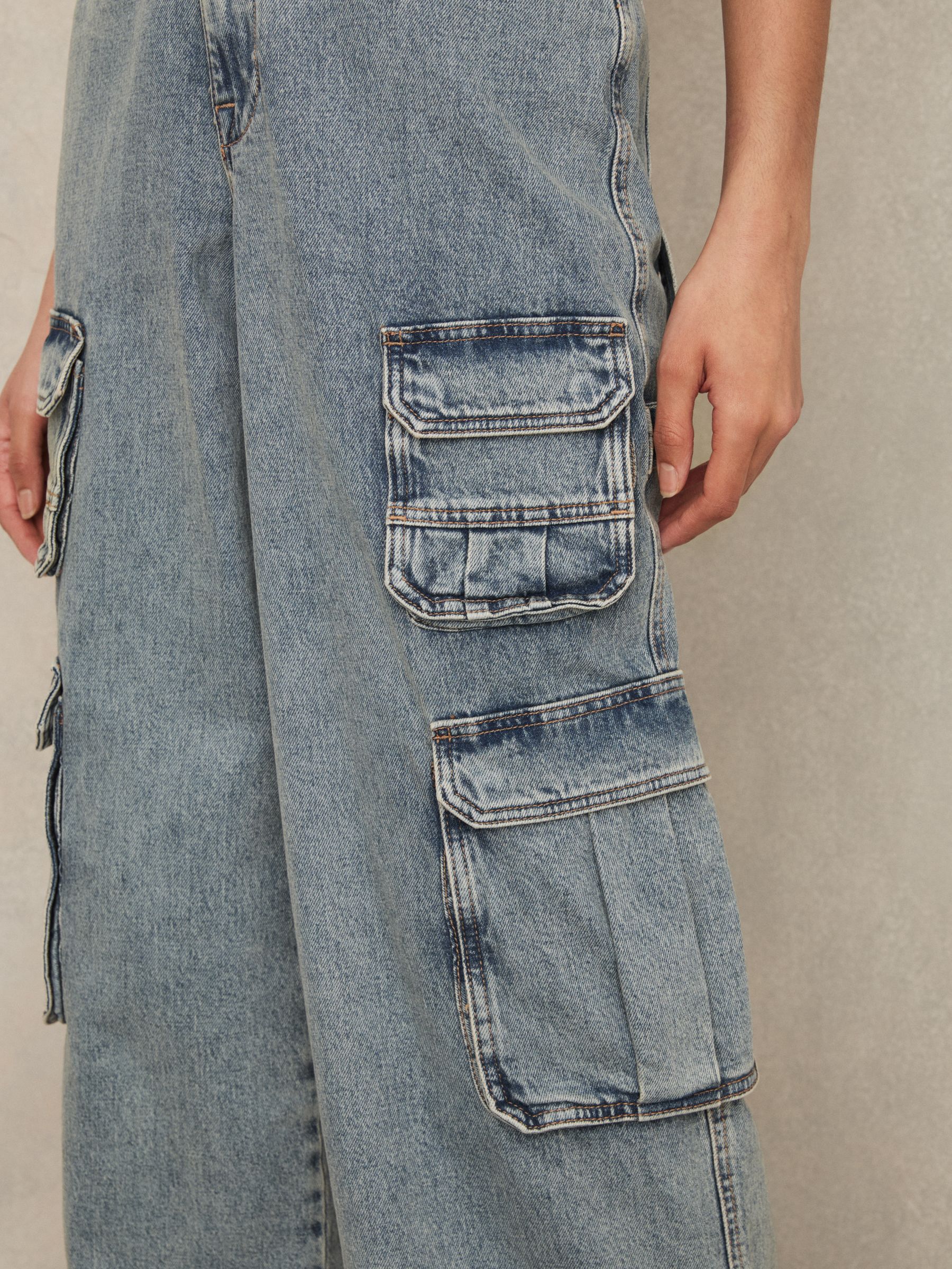 Good American Denim Cargo Jumpsuit in Indigo