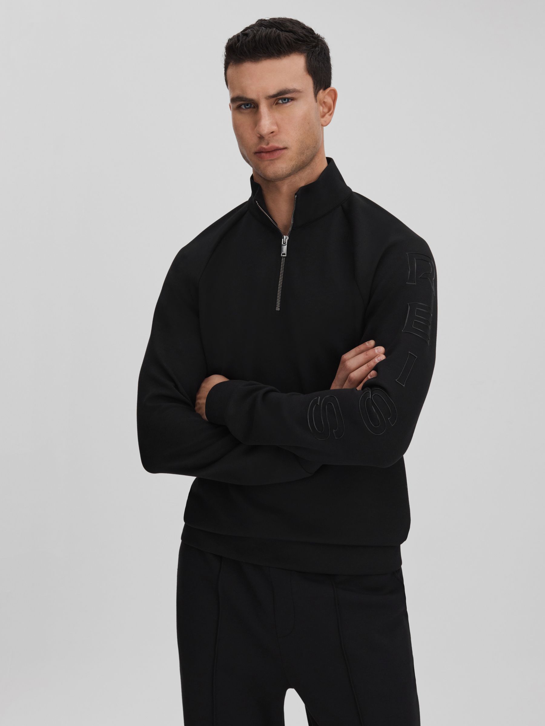 Interlock Jersey Half-Zip Funnel Neck Sweatshirt in Black
