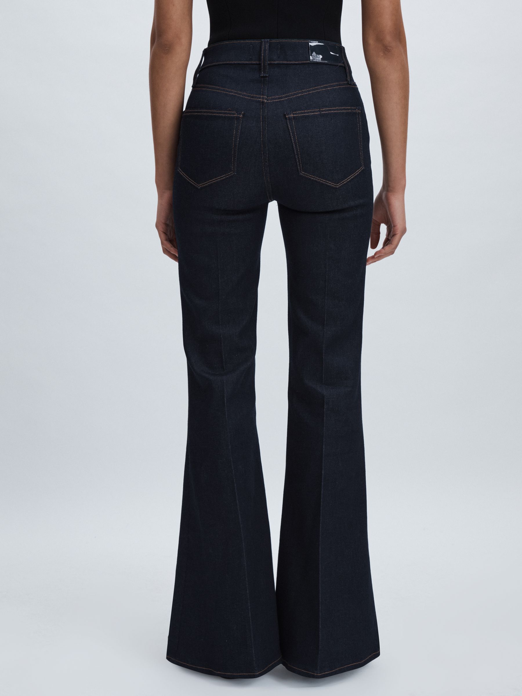 Paige Angled-Waist Flared Jeans in Kira Blue