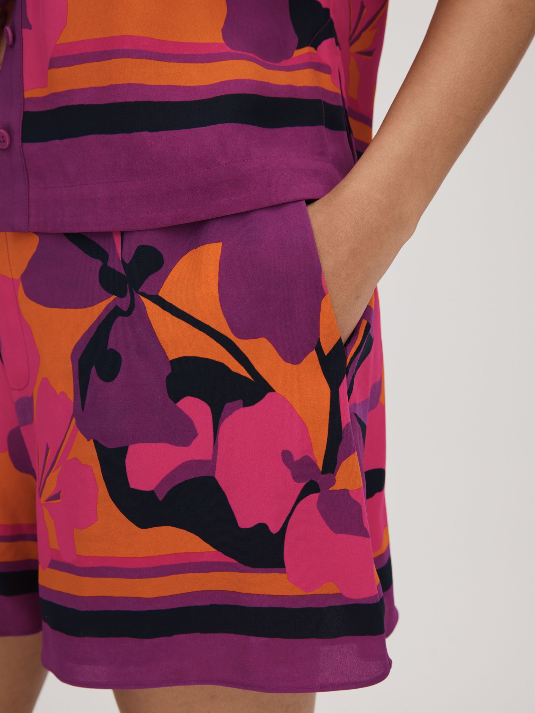 Florere Printed High Rise Shorts in Pink/Orange