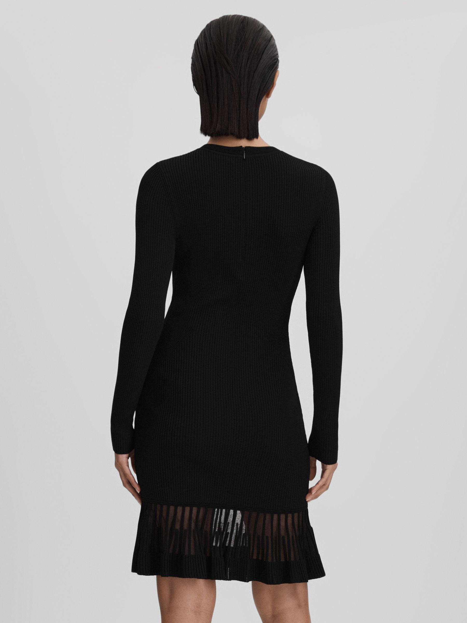 Knitted Sheer Flared Mini Dress in Black