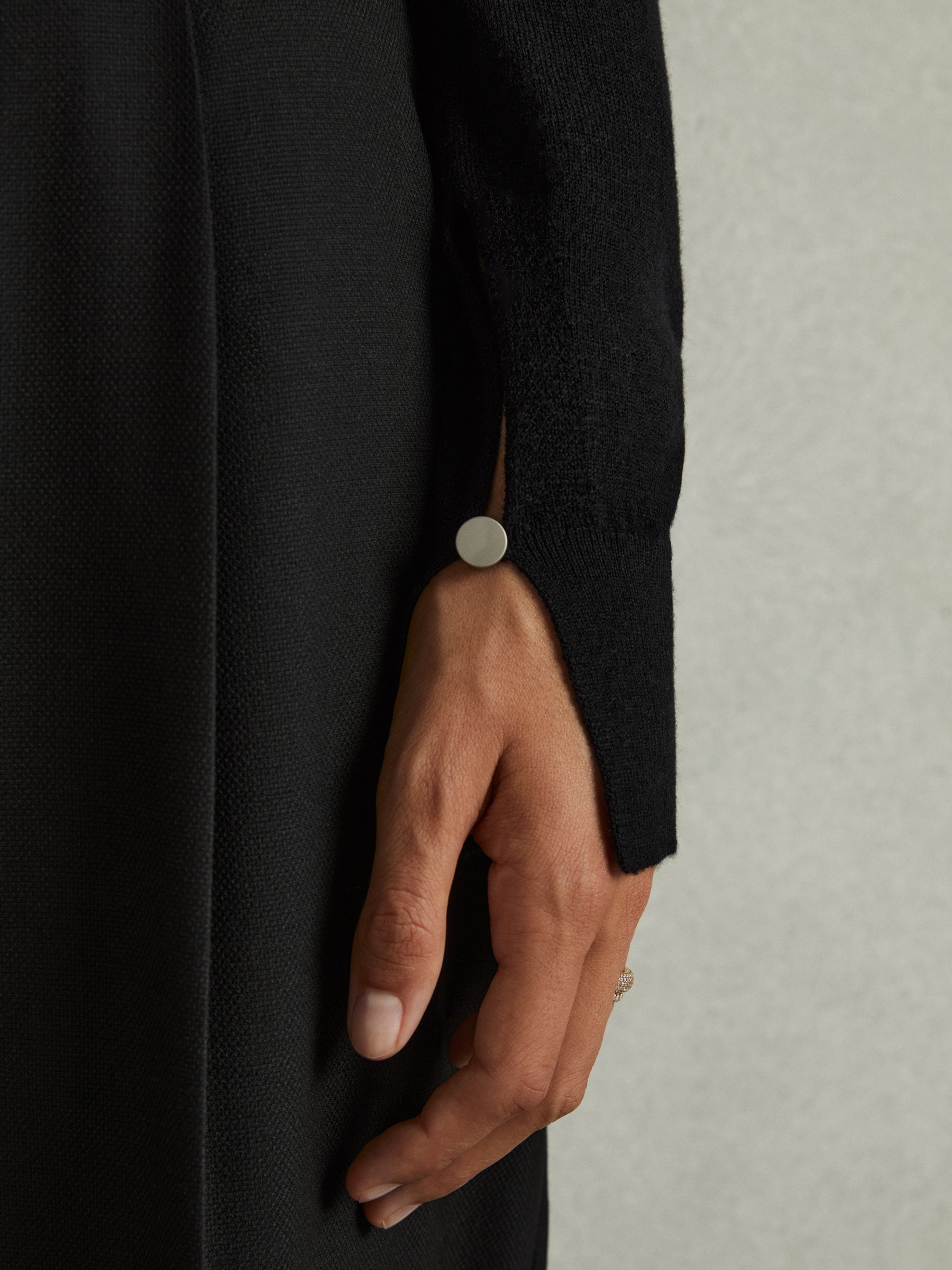 Merino Wool Roll Neck Jumper in Black