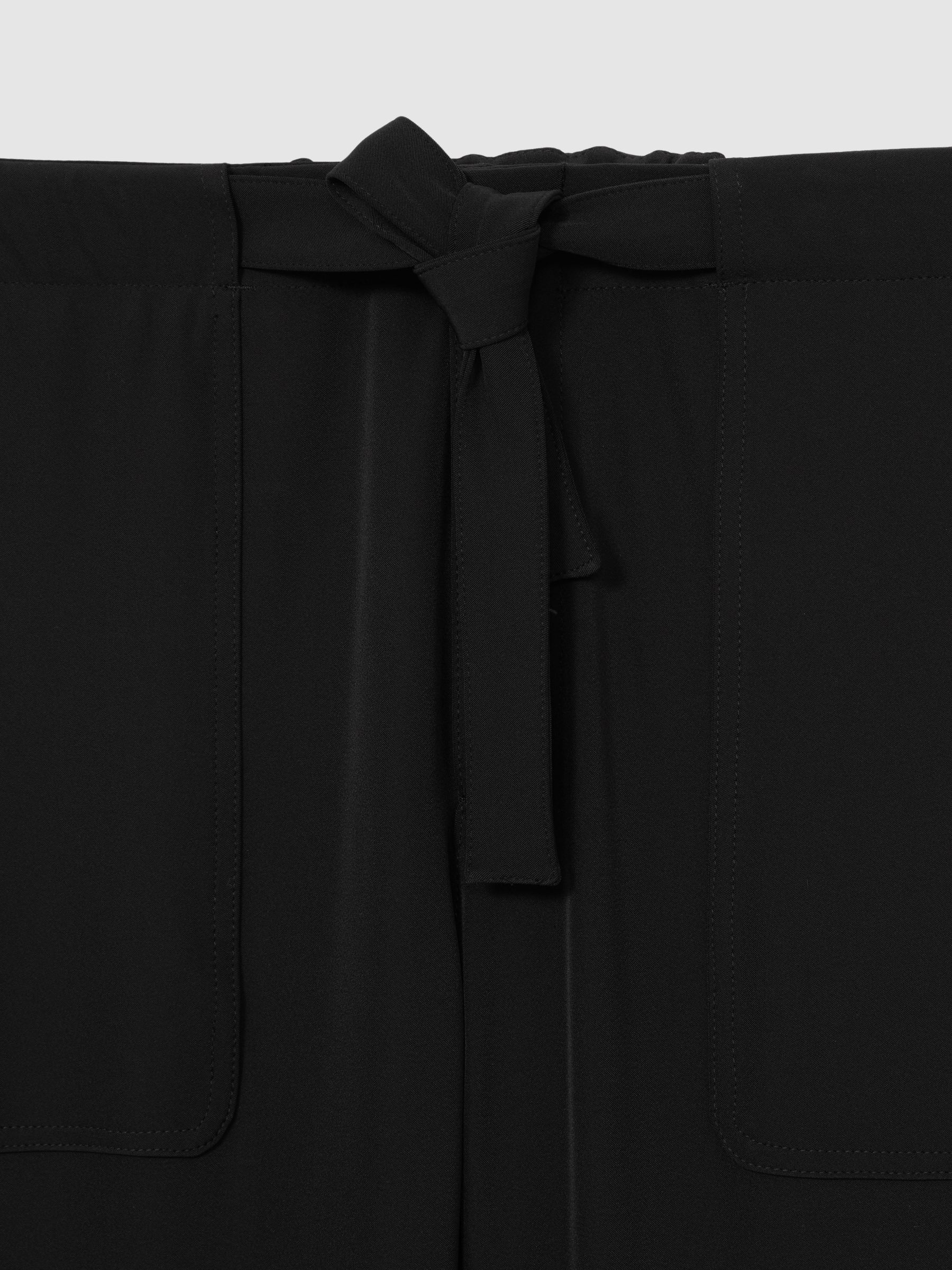 Belted Technical Tapered Trousers in Black