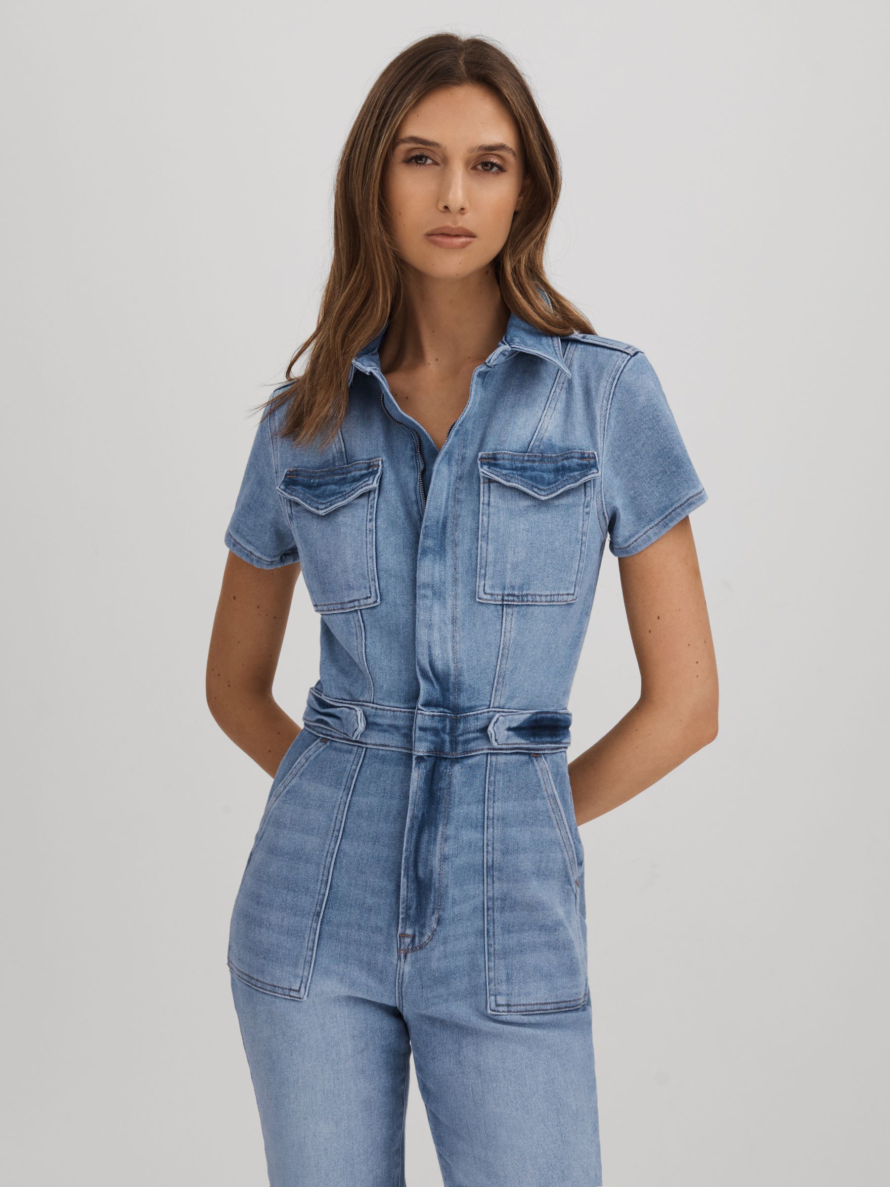 Good American Denim Skinny Jumpsuit in Mid Blue