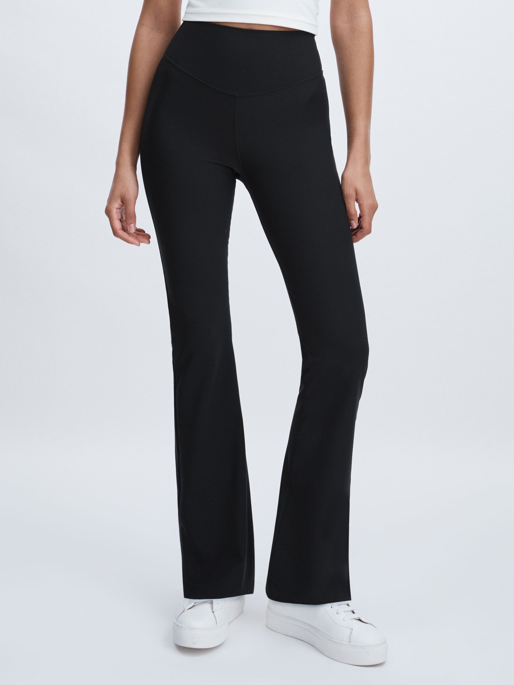 The Upside High Rise Flared Leggings in Black