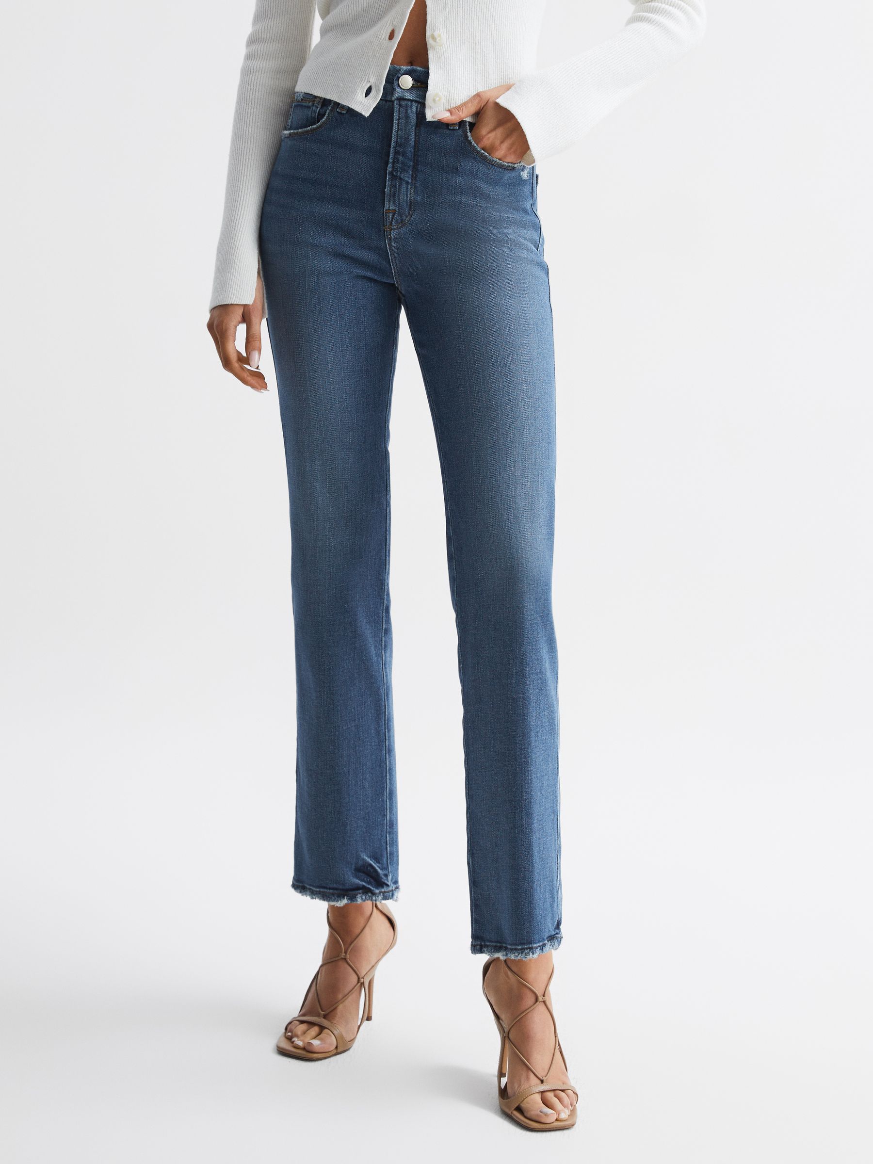 Good American Distressed Straight Leg Jeans in Mid Blue