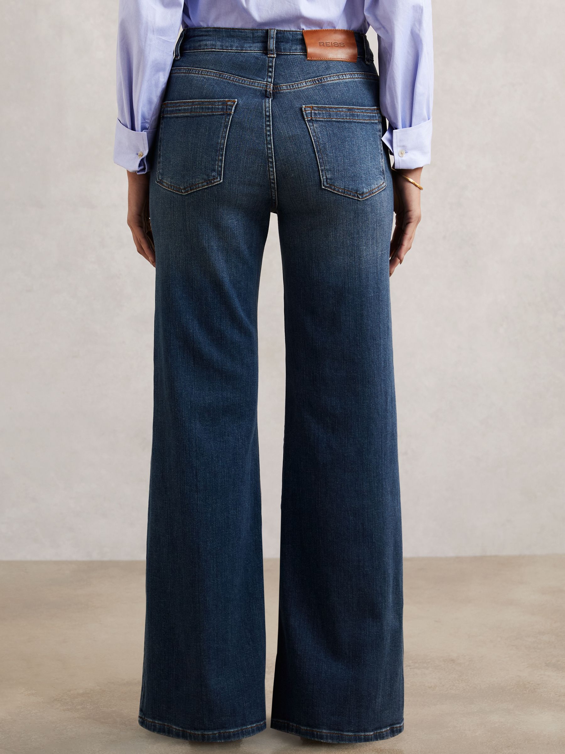 Mid-Rise Flared Jeans in Mid Blue