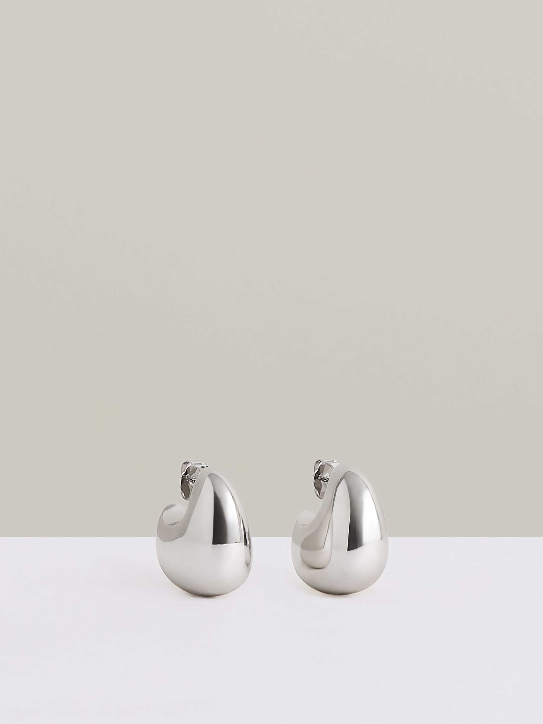 Curve Scoop Earrings in Silver Tone