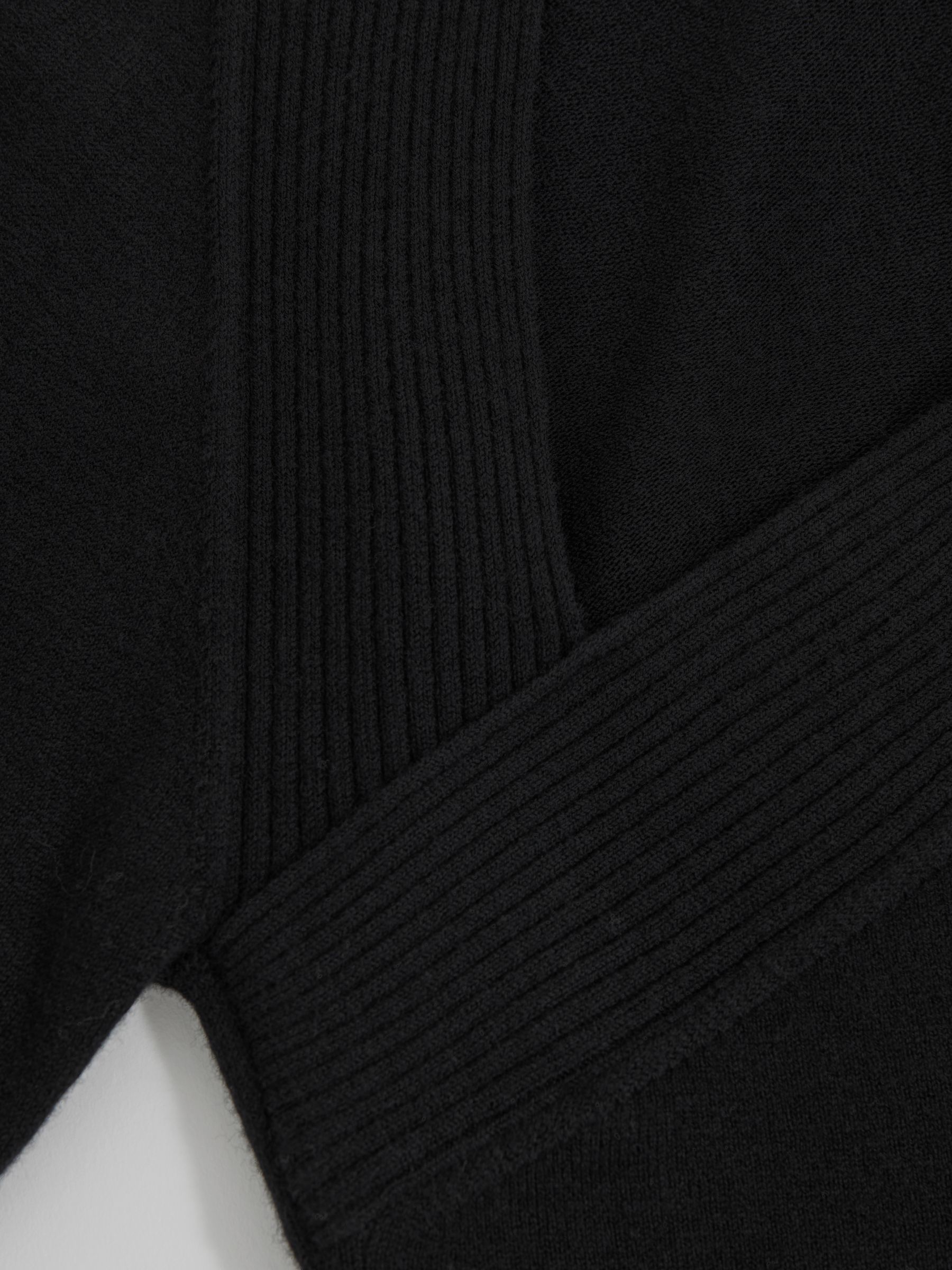 Wool-Blend Asymmetric Knit Top in Black