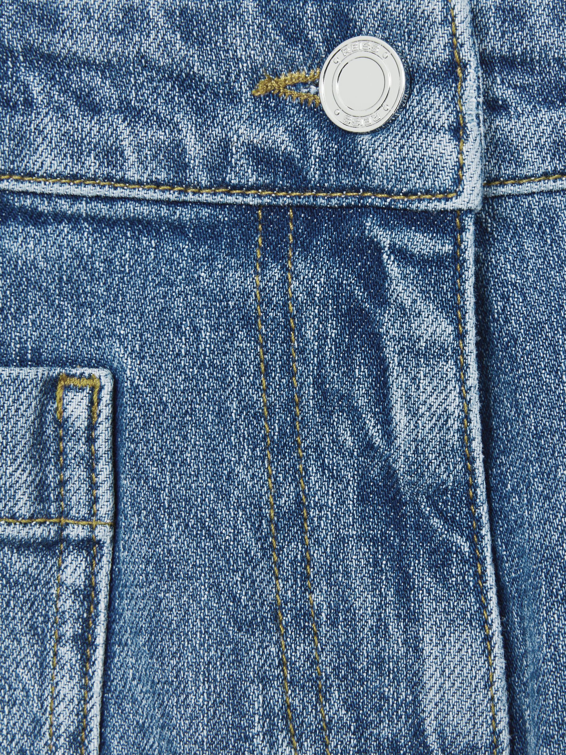 Mid-Rise Patch Pocket Denim Shorts in Mid Blue