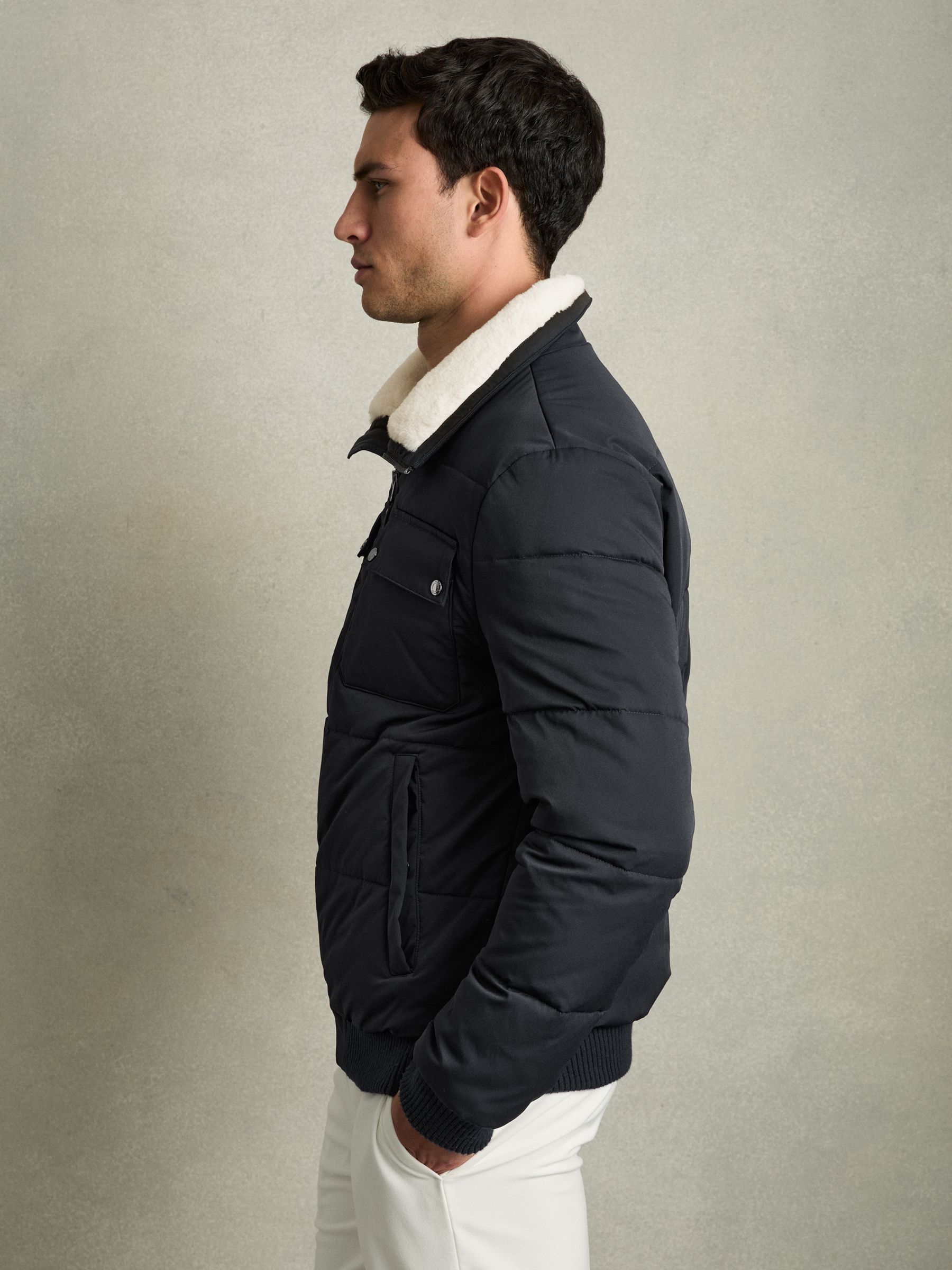 Faux-Fur Collar Puffer Jacket in Navy/ White Borg