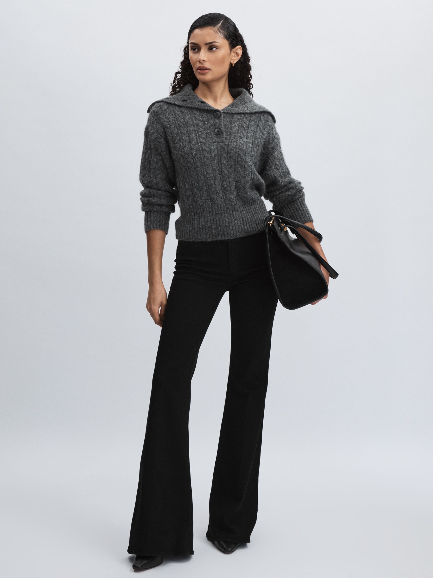 Paige Angled Waist Flared Jeans in Black