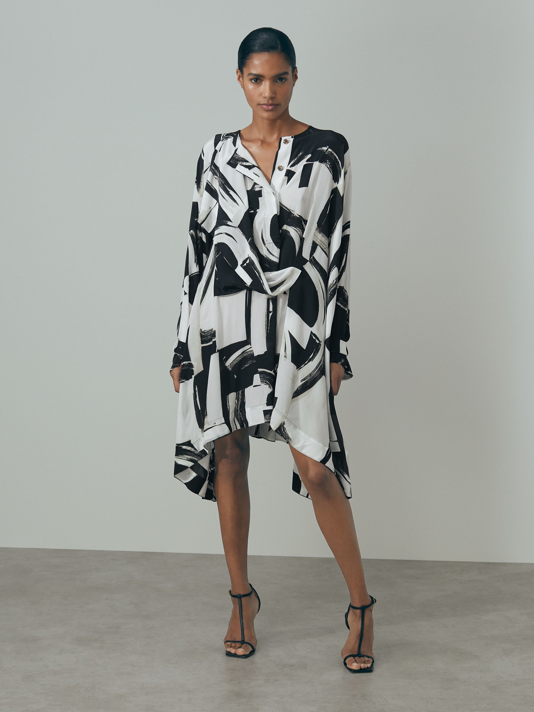 Atelier Italian Cape Sleeve Mini Dress in White/Black