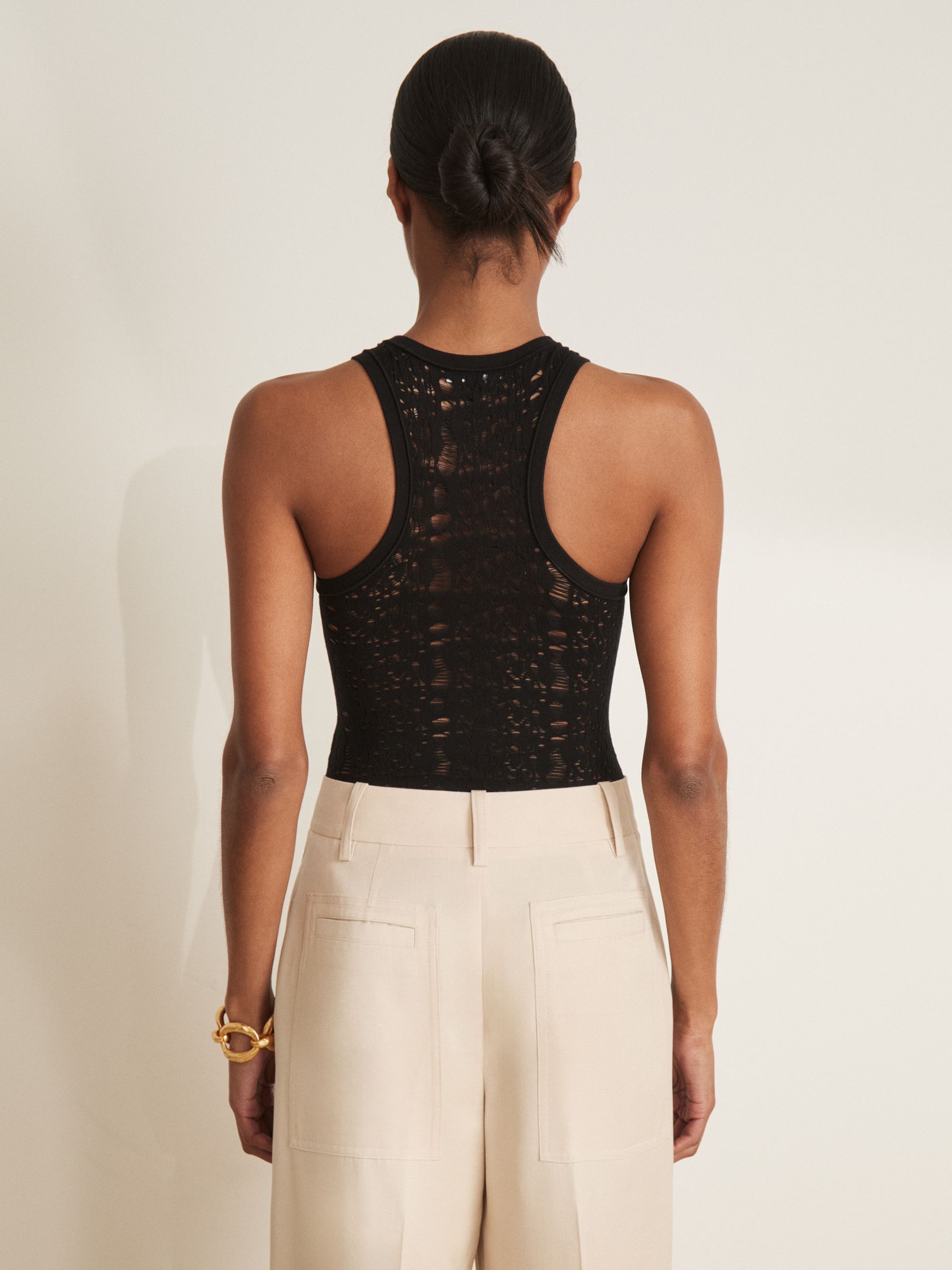 Atelier Lace-Knit High-Neck Bodysuit in Black