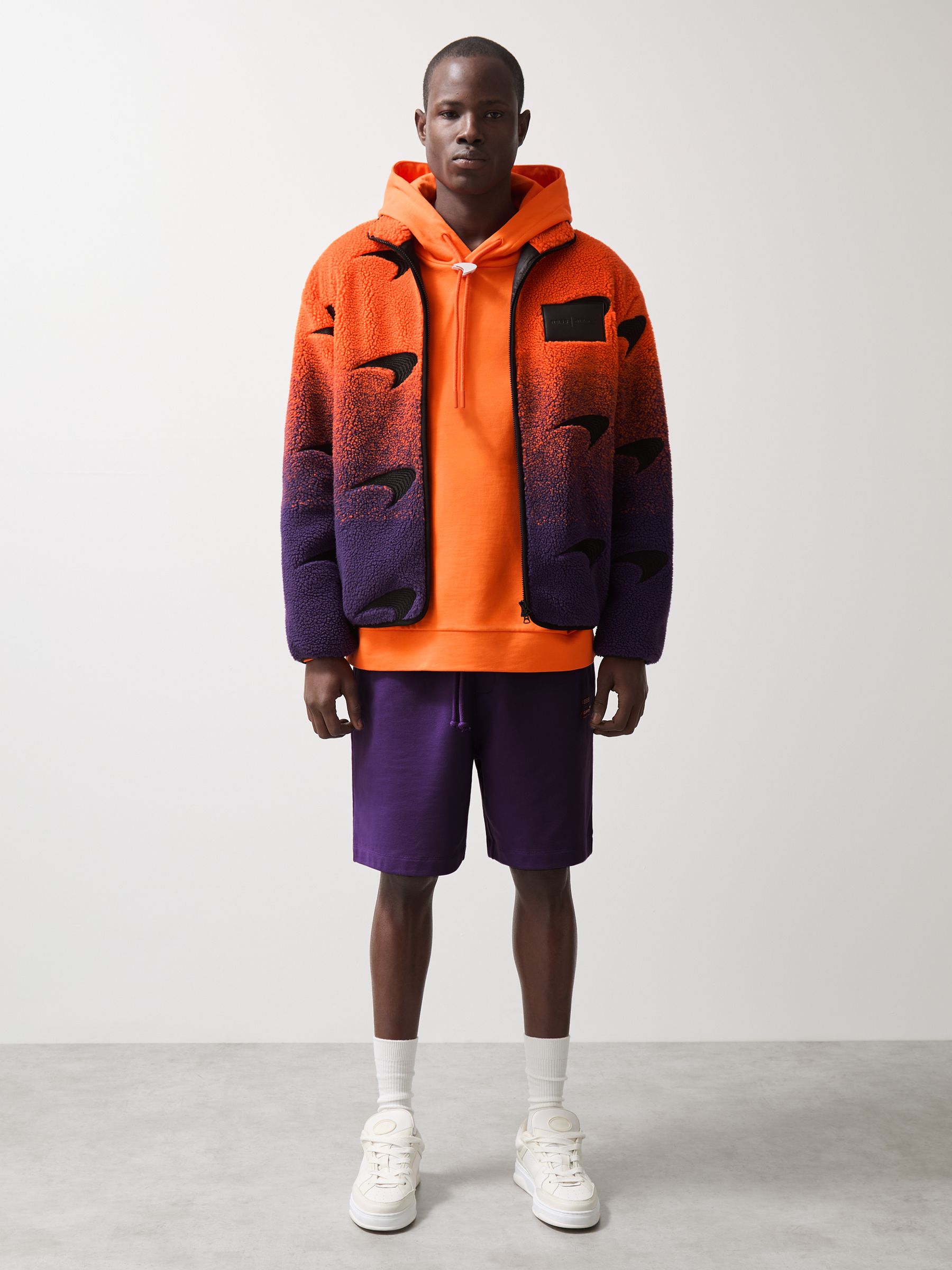 Unisex Fit McLaren F1 Team Ombré Fleece Jacket in Papaya Orange/Purple