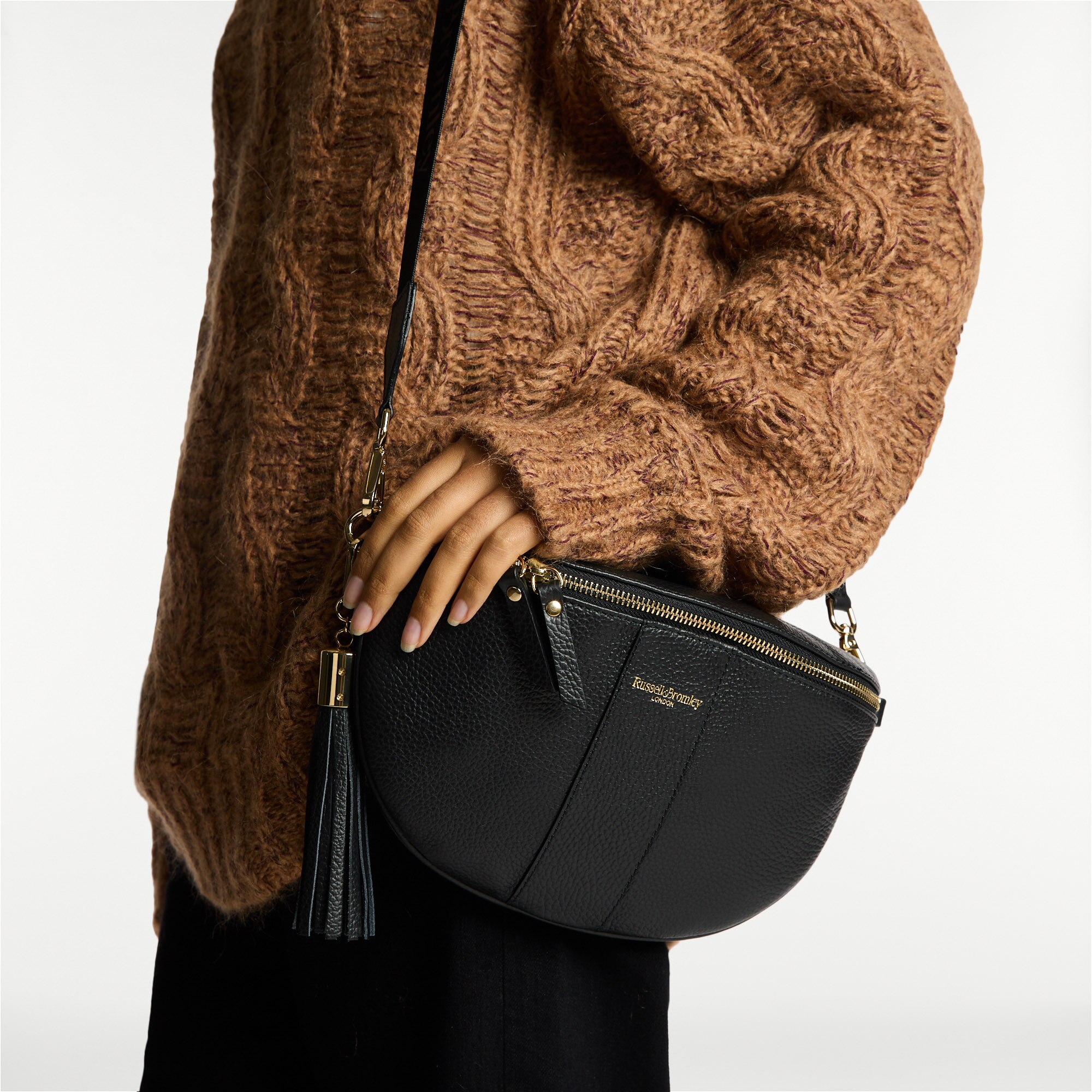 Rotate<br>Curved Crossbody Bag