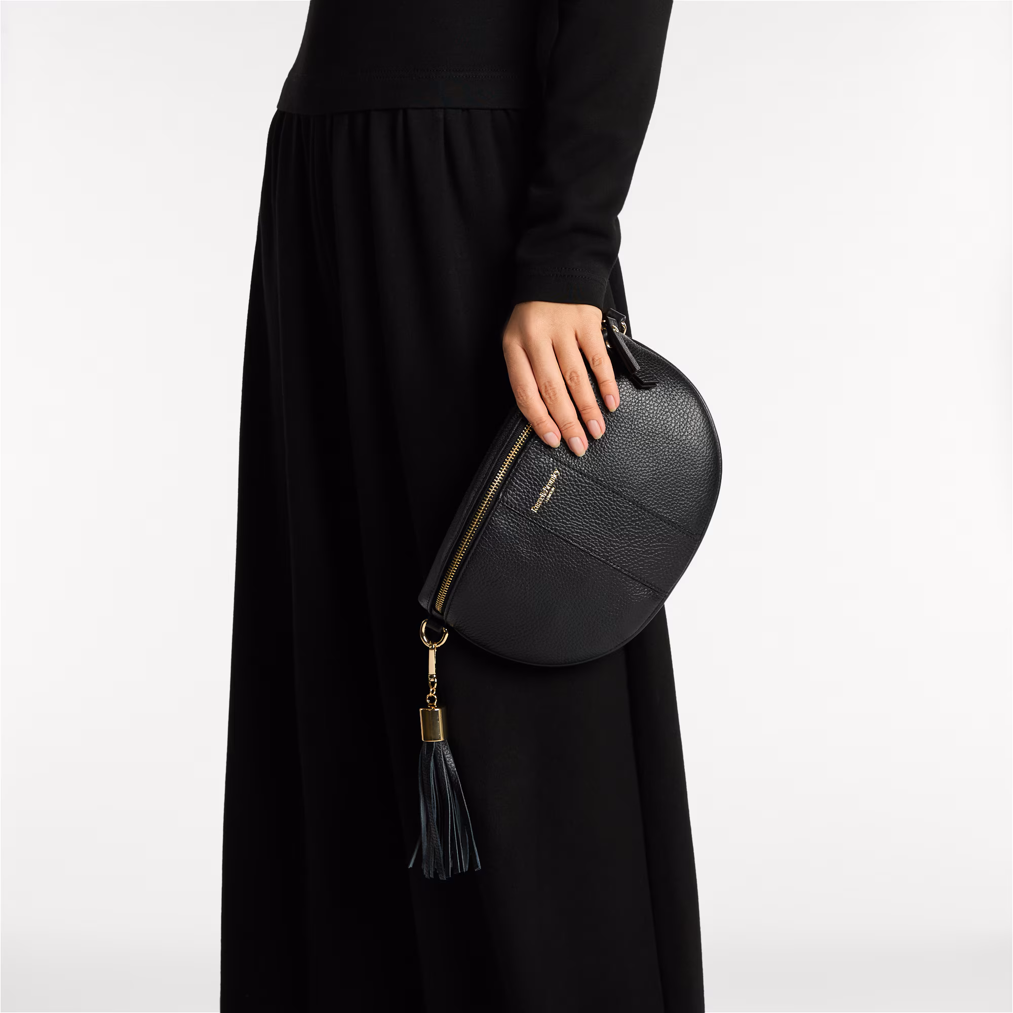 Rotate<br>Curved Crossbody Bag