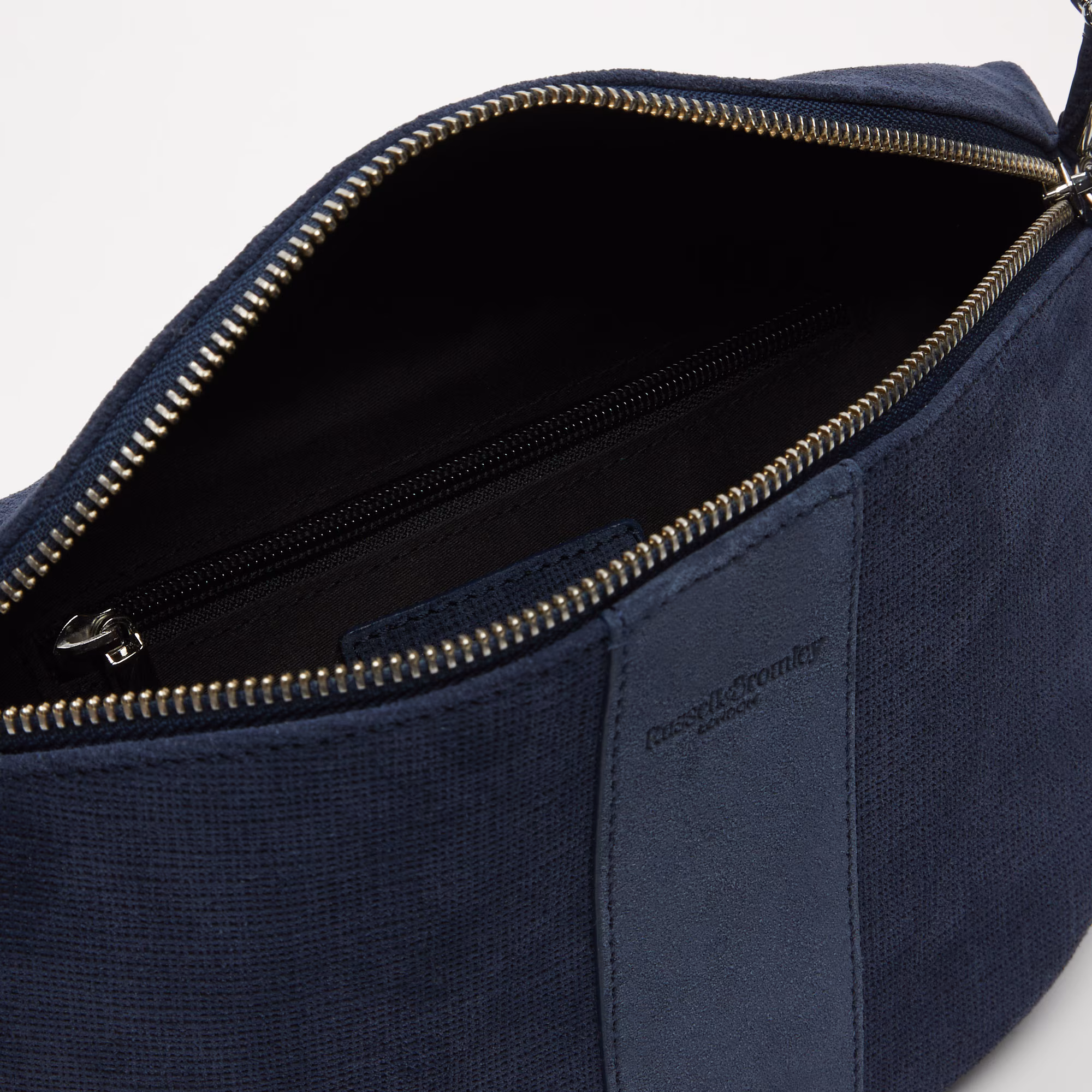 Rotate<br>Curved Crossbody Bag