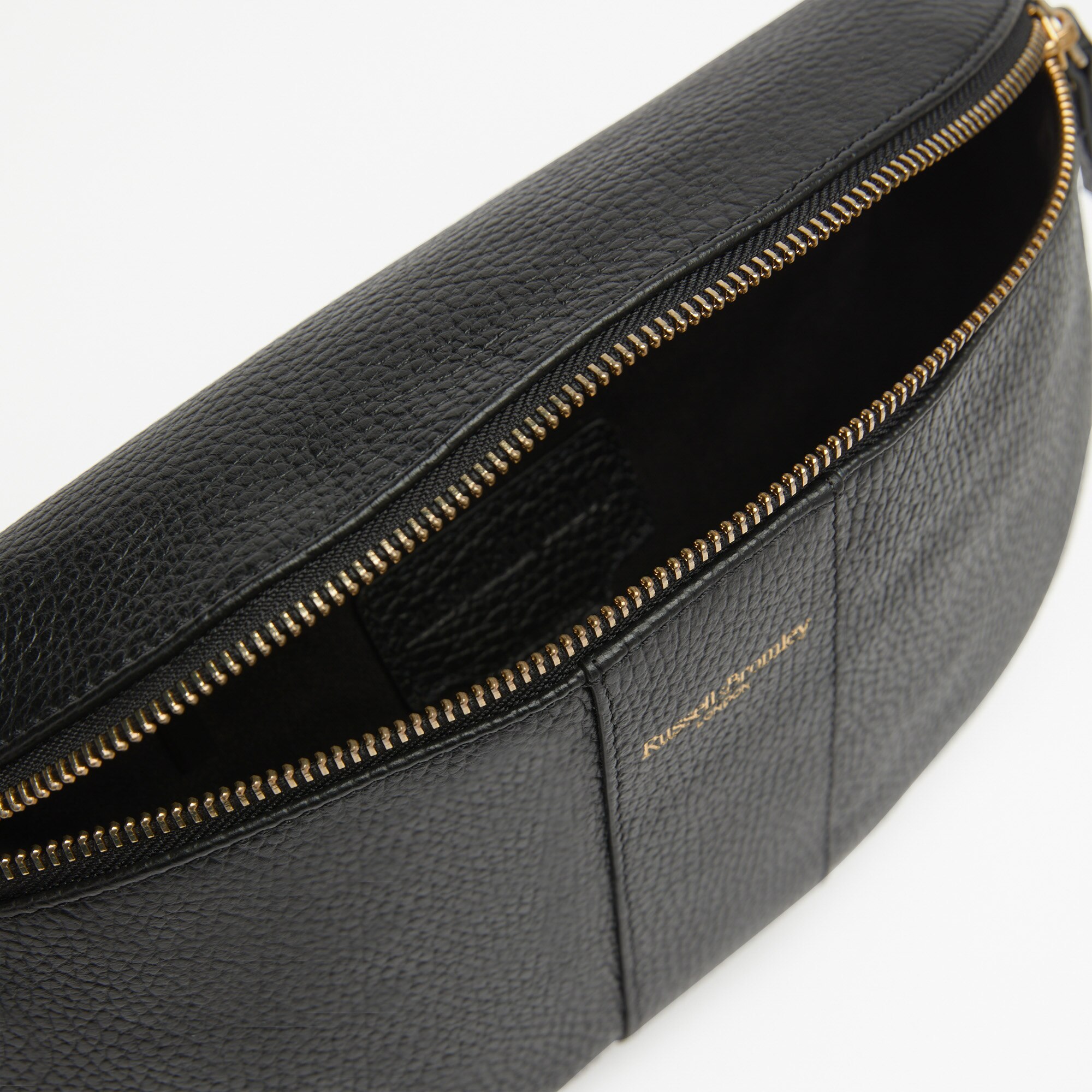 Rotate<br>Curved Crossbody Bag