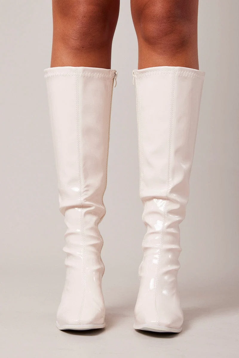 White Knee High Boots in Patent