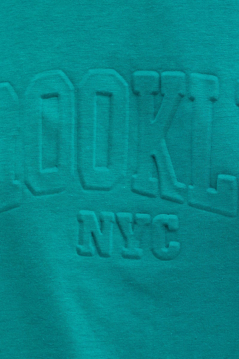 Green Textured Tee And Biker Shorts Set