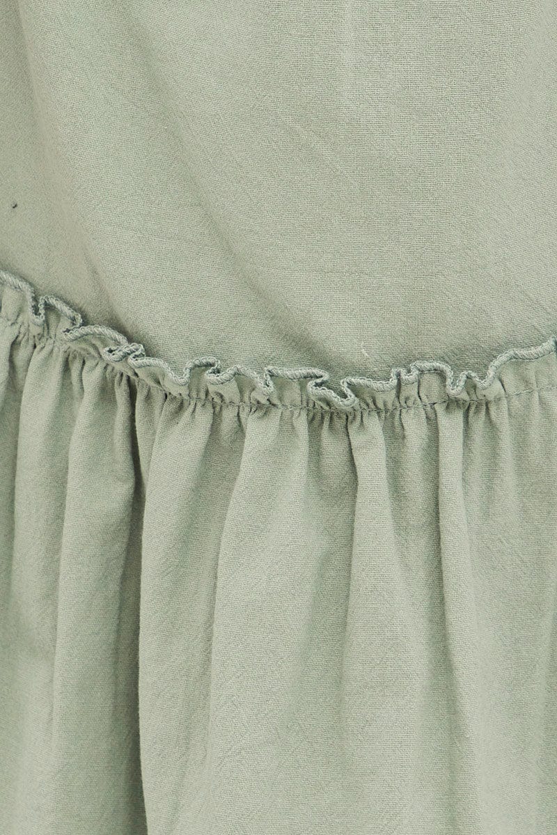 Green Bell Sleeve Peplum Top