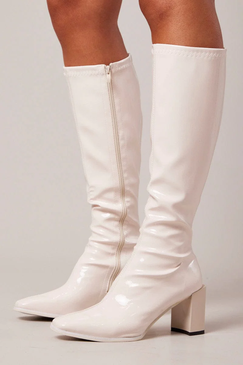 White Knee High Boots in Patent