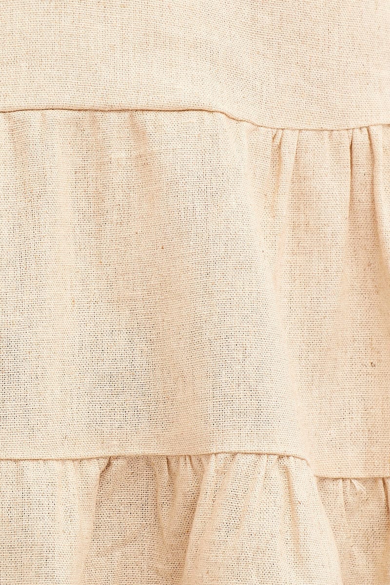 Beige Peplum Top Sleeveless