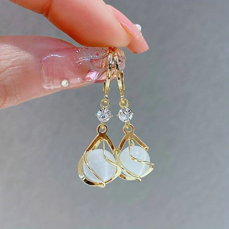 White Opal Vintage Dangle Earrings in Gold