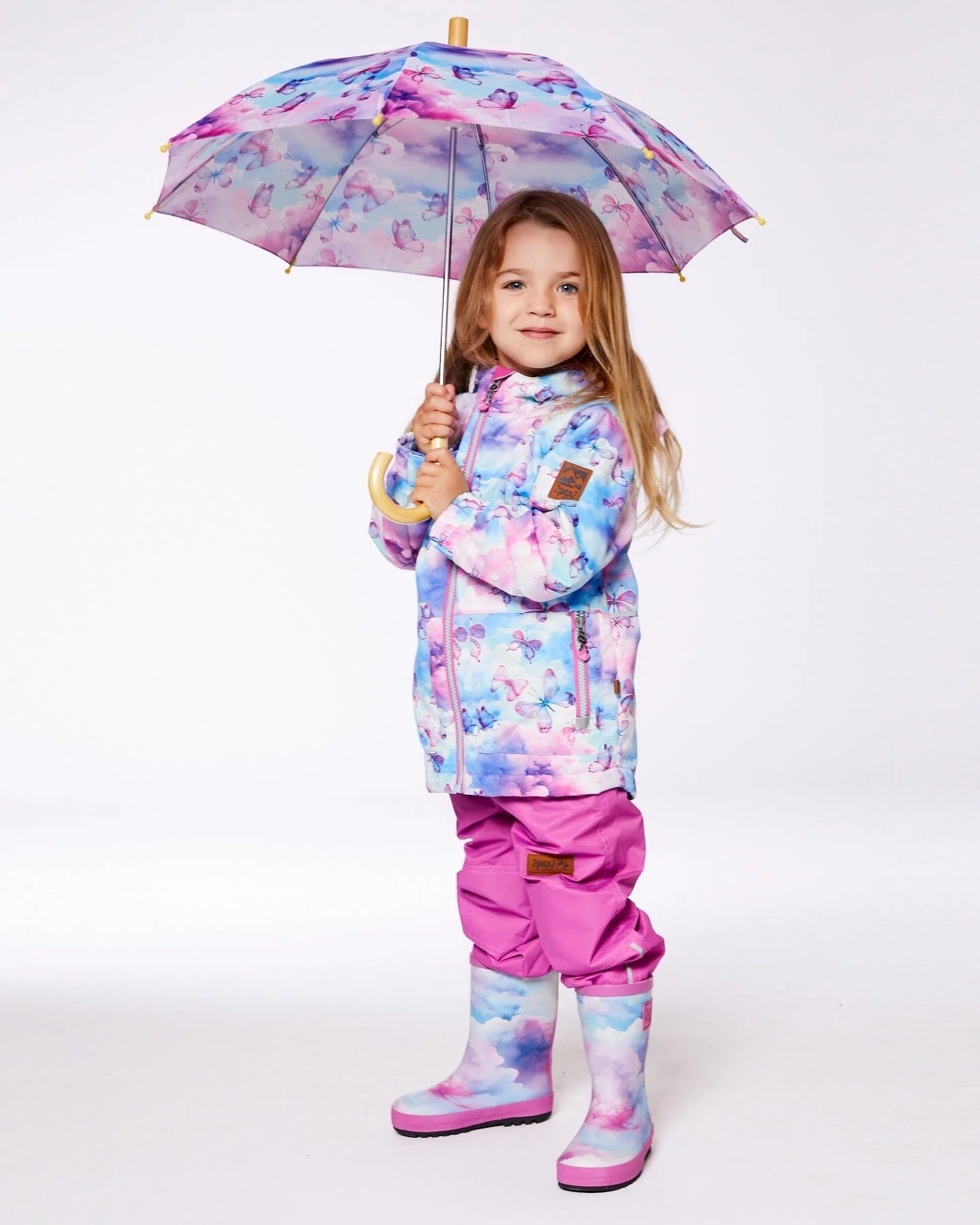 Printed Rain Boots Multicolored And Vibrant Pink Background - Deux par Deux