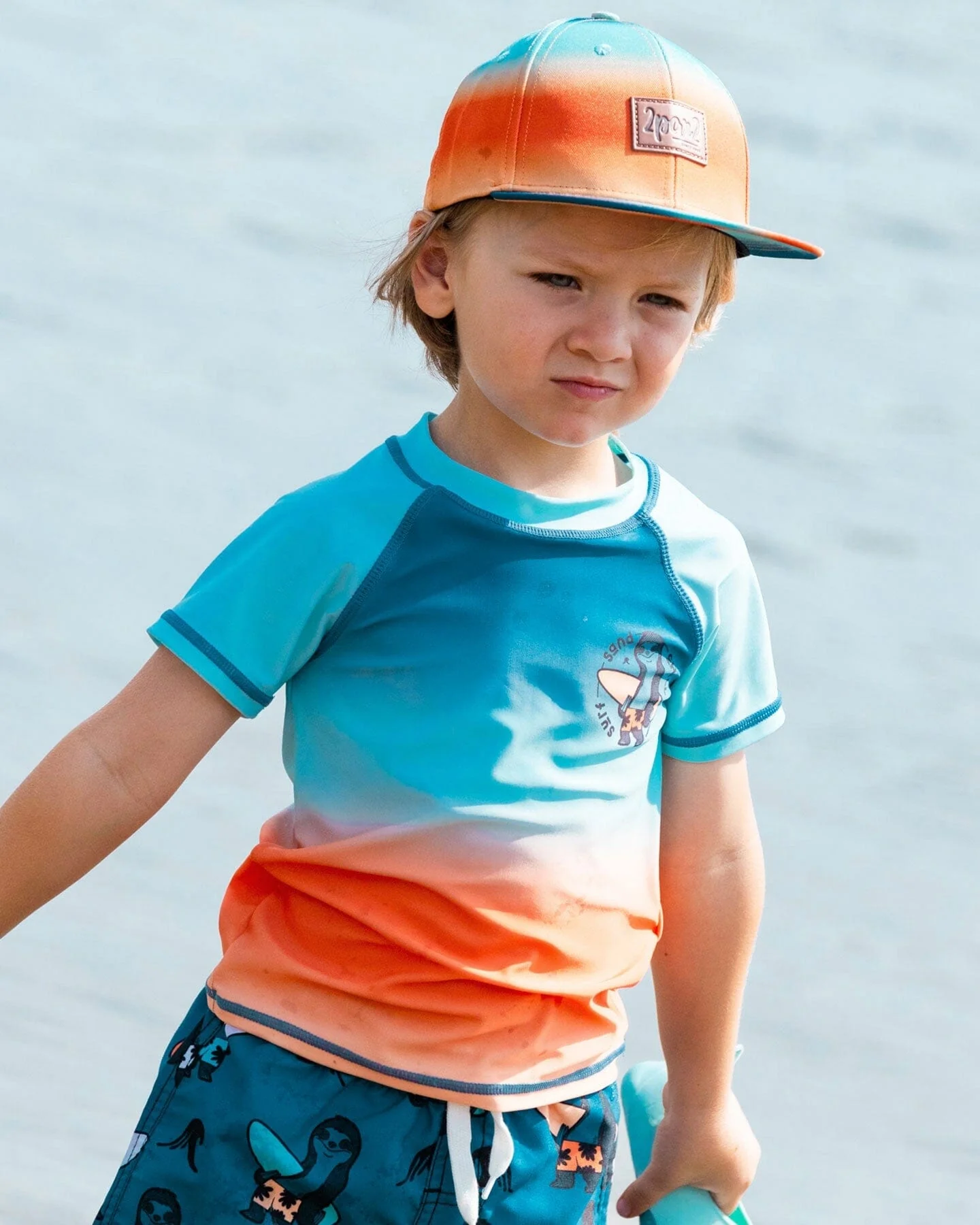 Short Sleeve Rashguard Navy Blue, Turquoise, And Orange - Deux par Deux