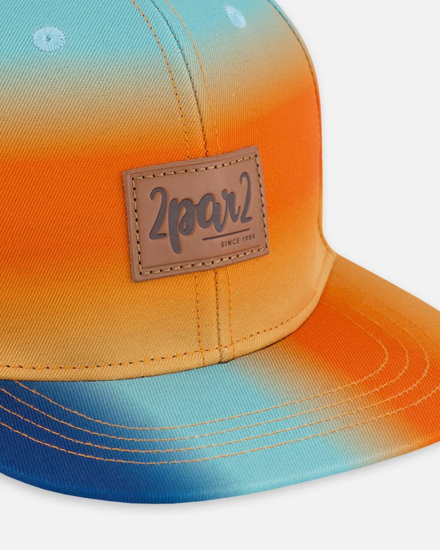 Printed Cap Navy Blue, Turquoise, And Orange - Deux par Deux