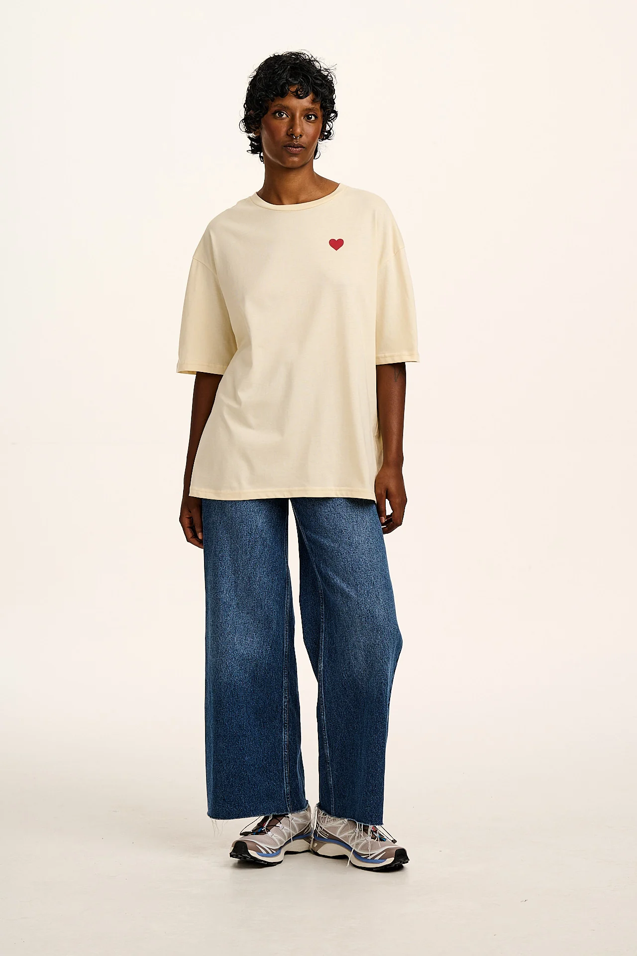 Benny - Organic Cotton Tee in Ecru with Logo Rainbow Stripe Print