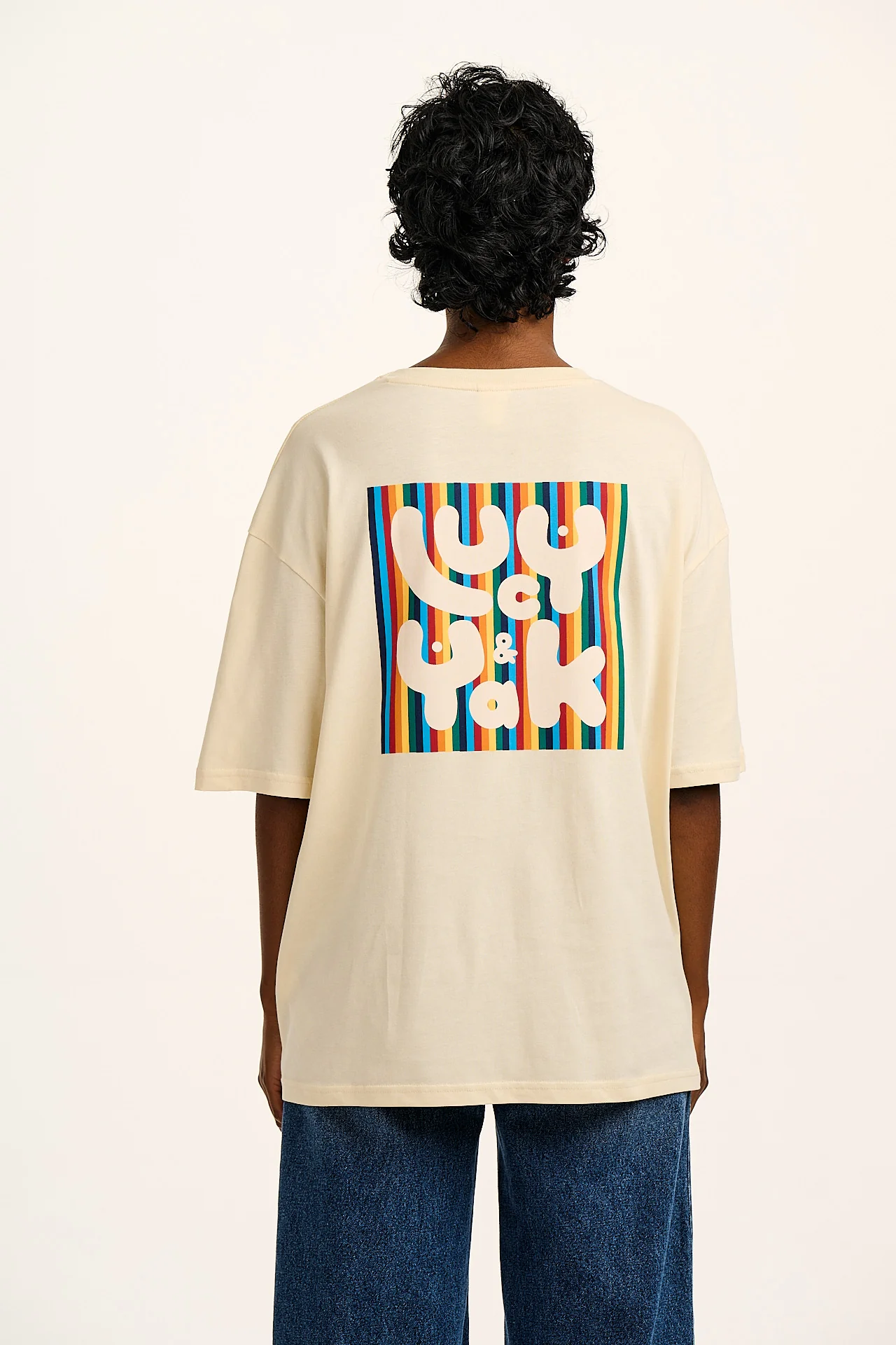 Benny - Organic Cotton Tee in Ecru with Logo Rainbow Stripe Print