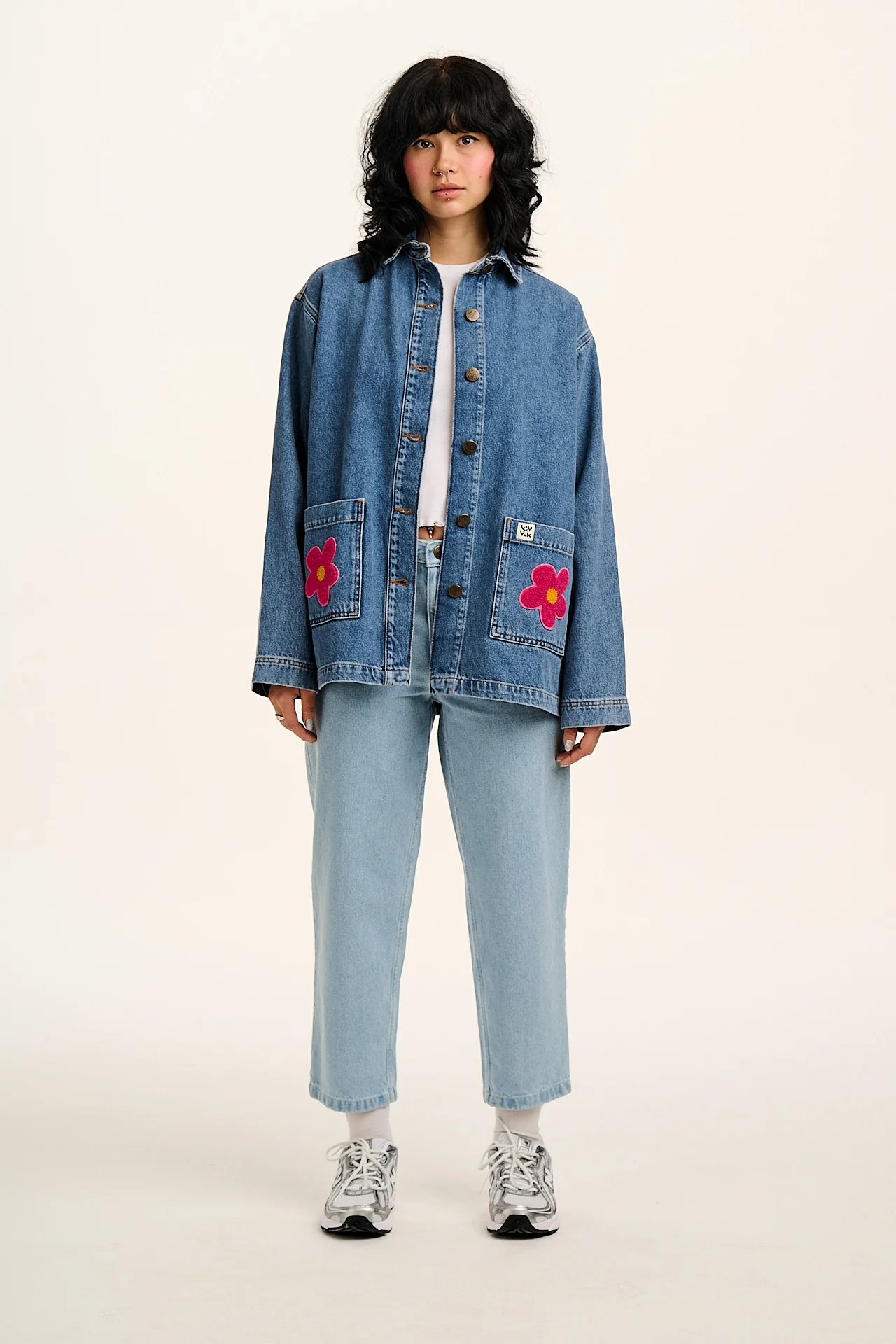 Olly - Denim Jacket in Mid Wash Blue with Pink Flower Motif