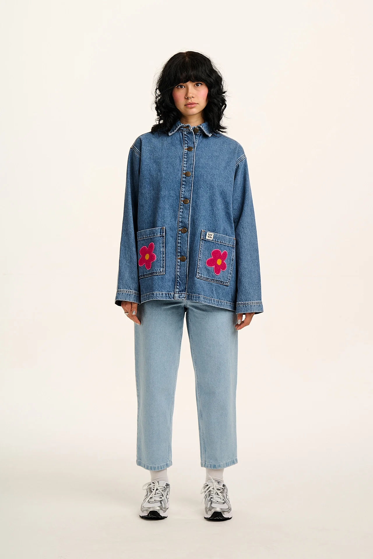 Olly - Denim Jacket in Mid Wash Blue with Pink Flower Motif