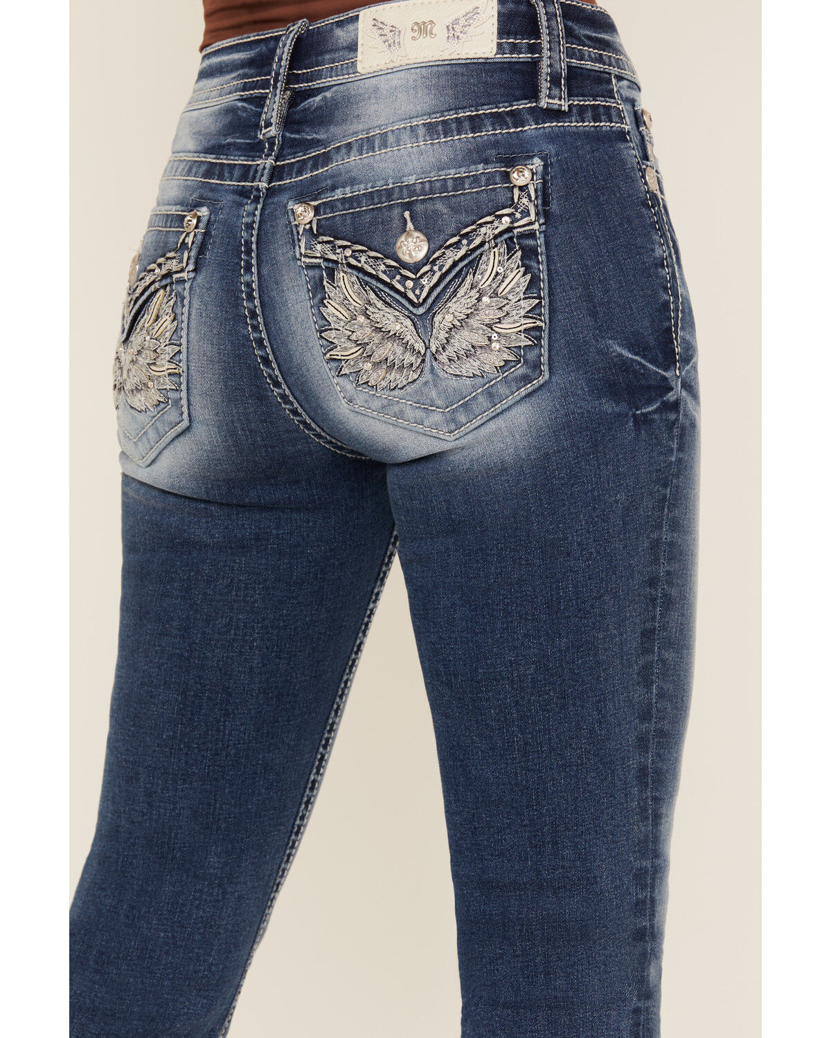 Miss Me Women's Medium Wash Mid Rise Winged Pocket Bootcut Stretch Denim Jeans