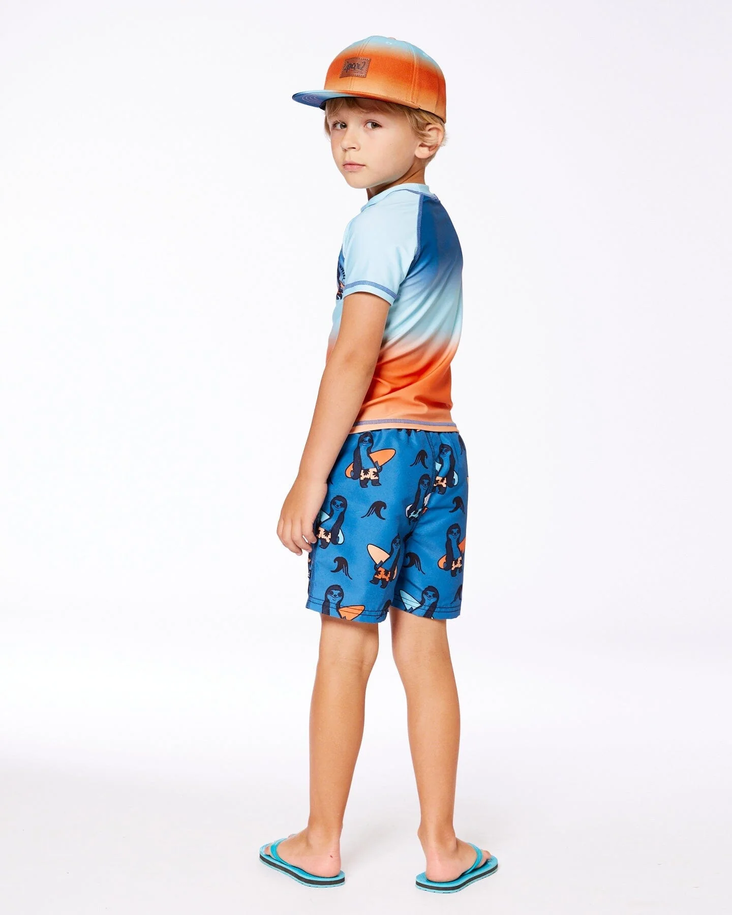 Printed Swim Trunks Orange Sloths On Navy Blue