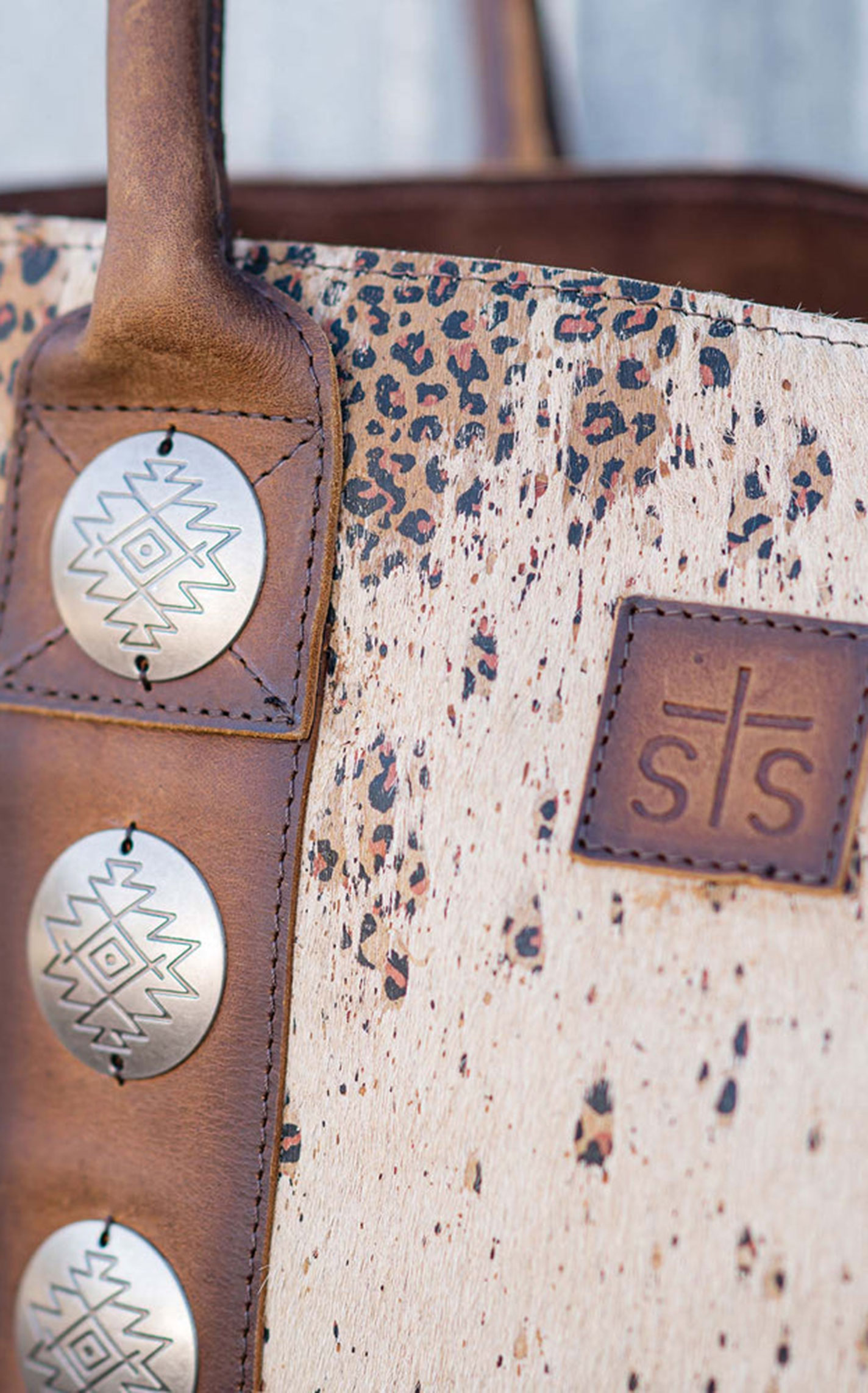 STS Ranchwear Cowhide Hair On Hide Serengeti Concho Tote Bag - Image 1