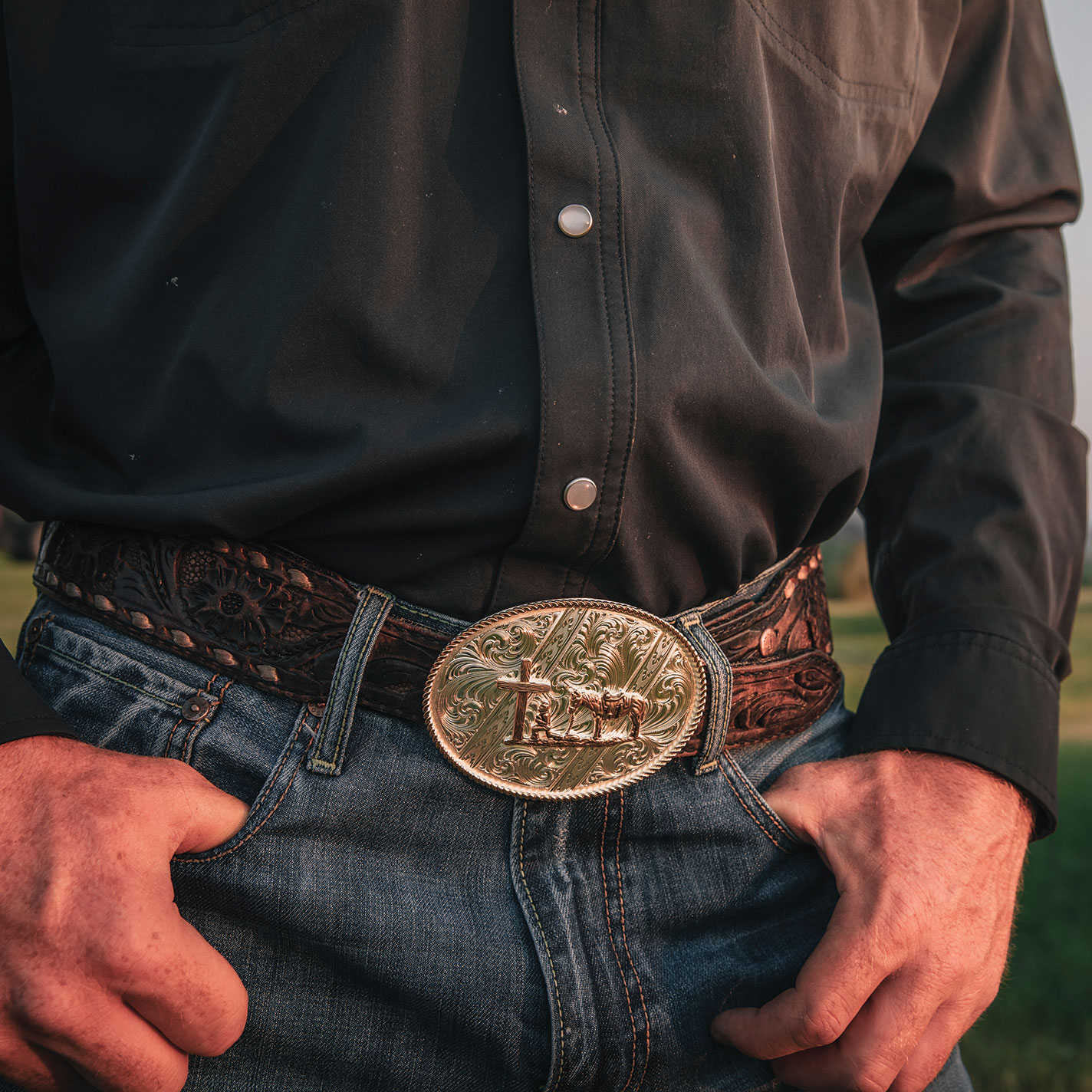 Montana Silversmiths Silver & Gold Kneeling Cowboy Belt Buckle - Image 1