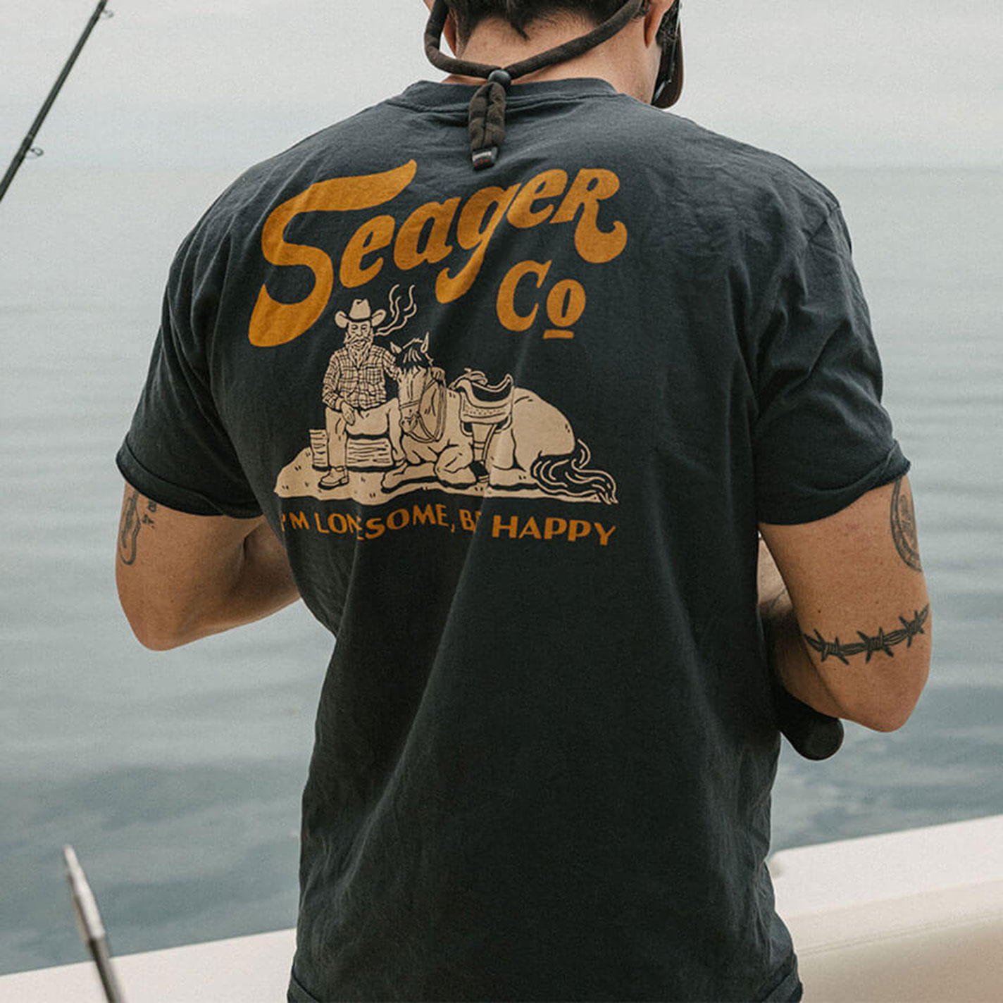 Seager Men's Lonesome Black Graphic T-Shirt - Image 1