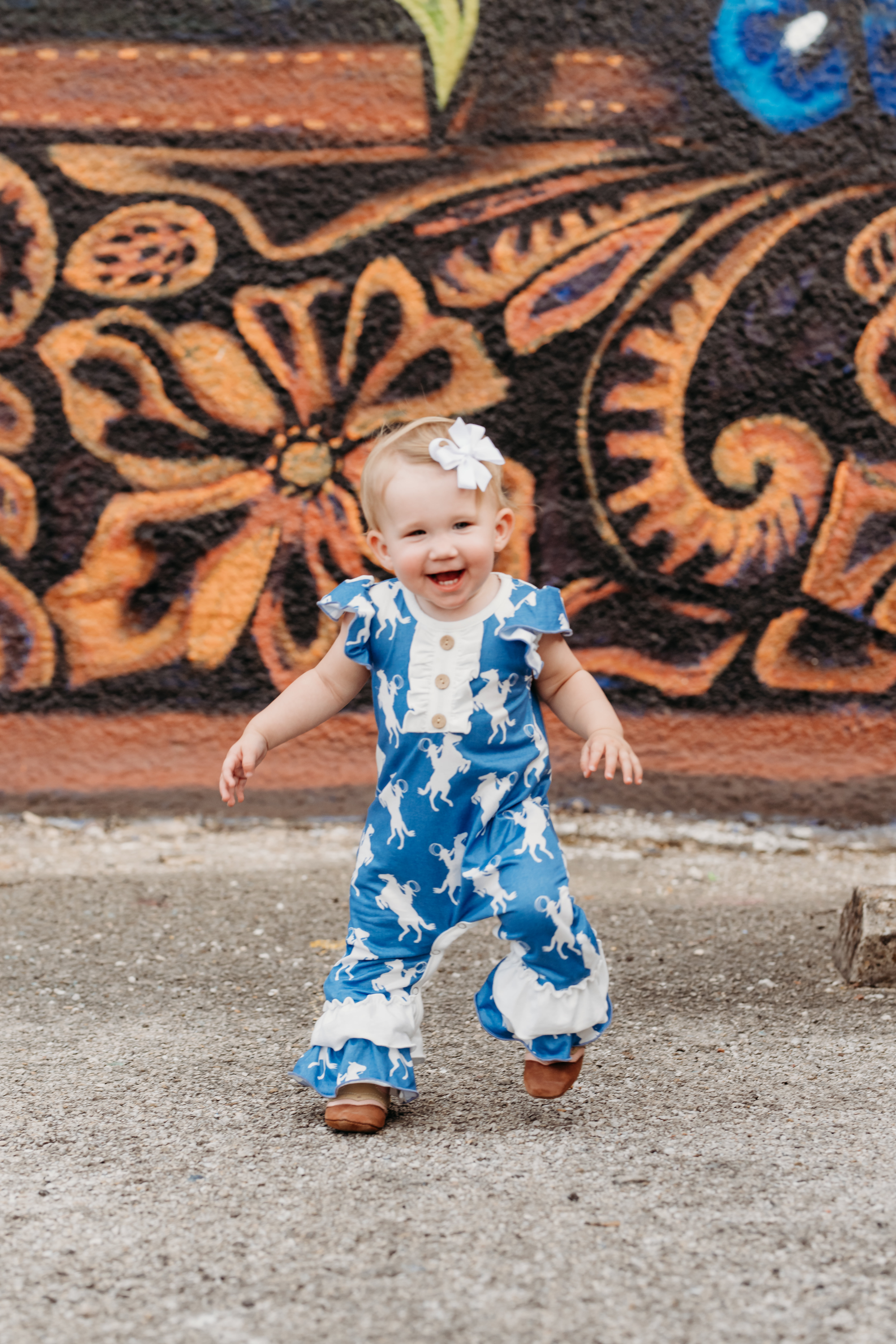 Shea Baby Toddler Girl's Blue & White Bronc Rider Romper - Image 1