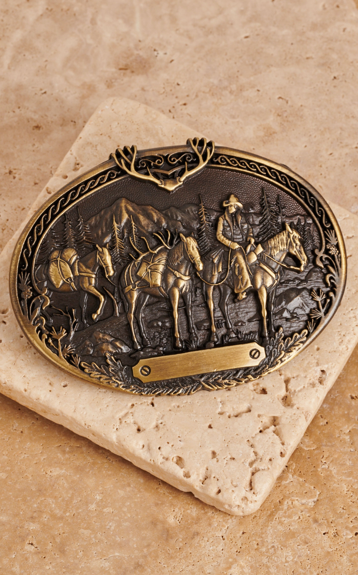 Montana Silversmiths Pack Horses and Rider Brass Heritage Attitude Belt Buckle - Image 1