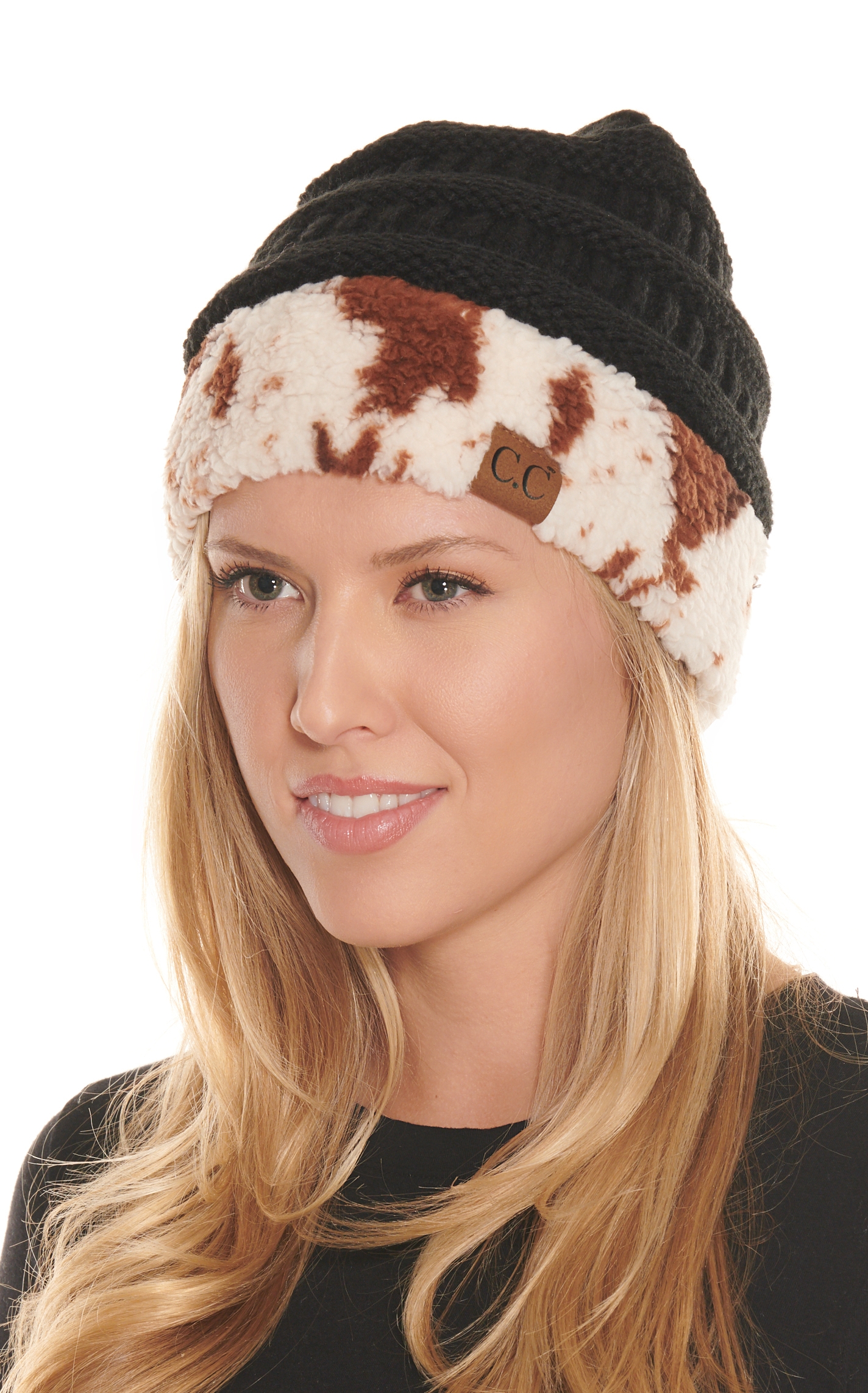 C.C. Brands Women's Black with Fleece Cow Print Knit Beanie - Image 1
