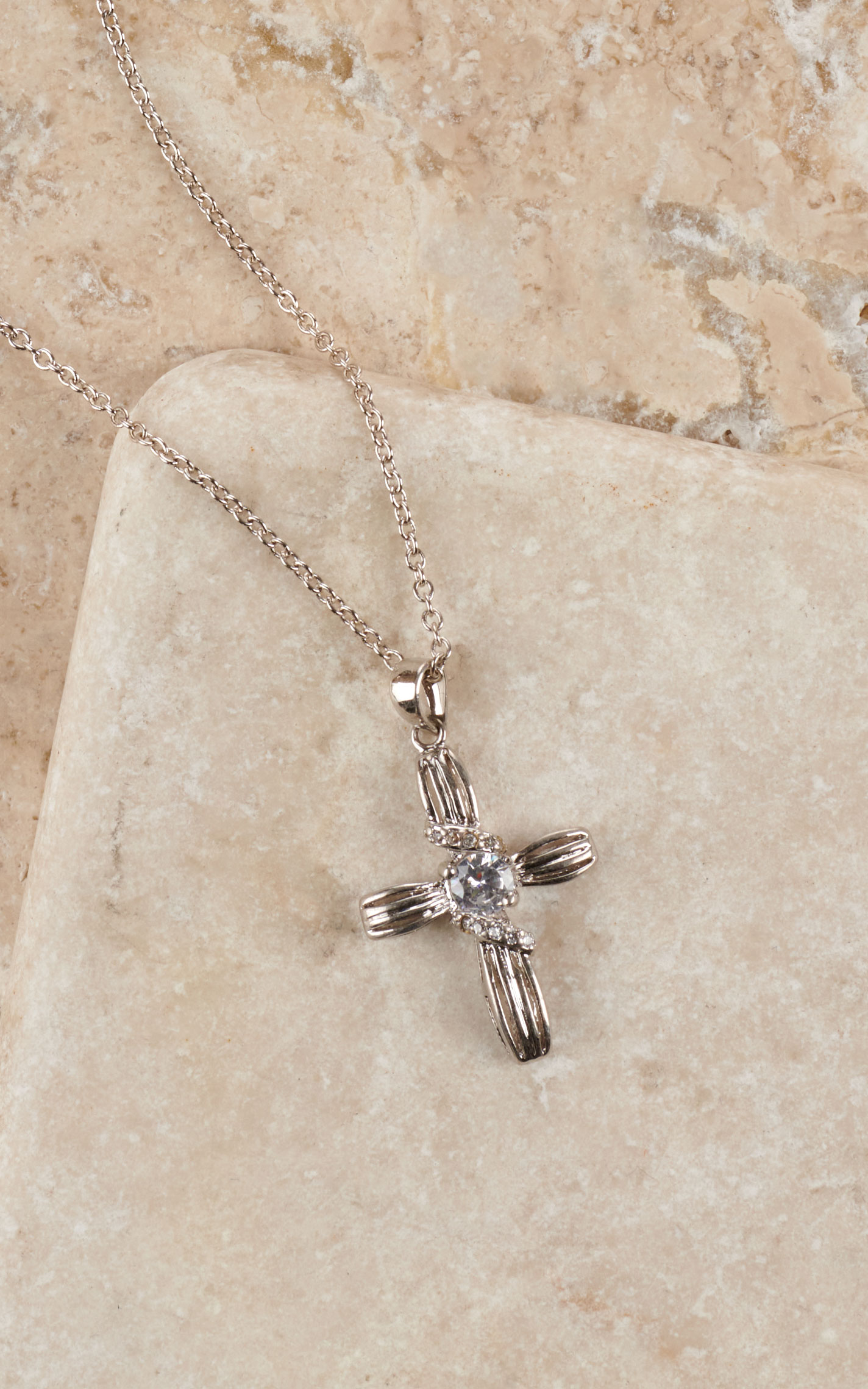 Montana Silversmiths Silver Ribbon with Crystal Center Cross Pendant Necklace - Image 1